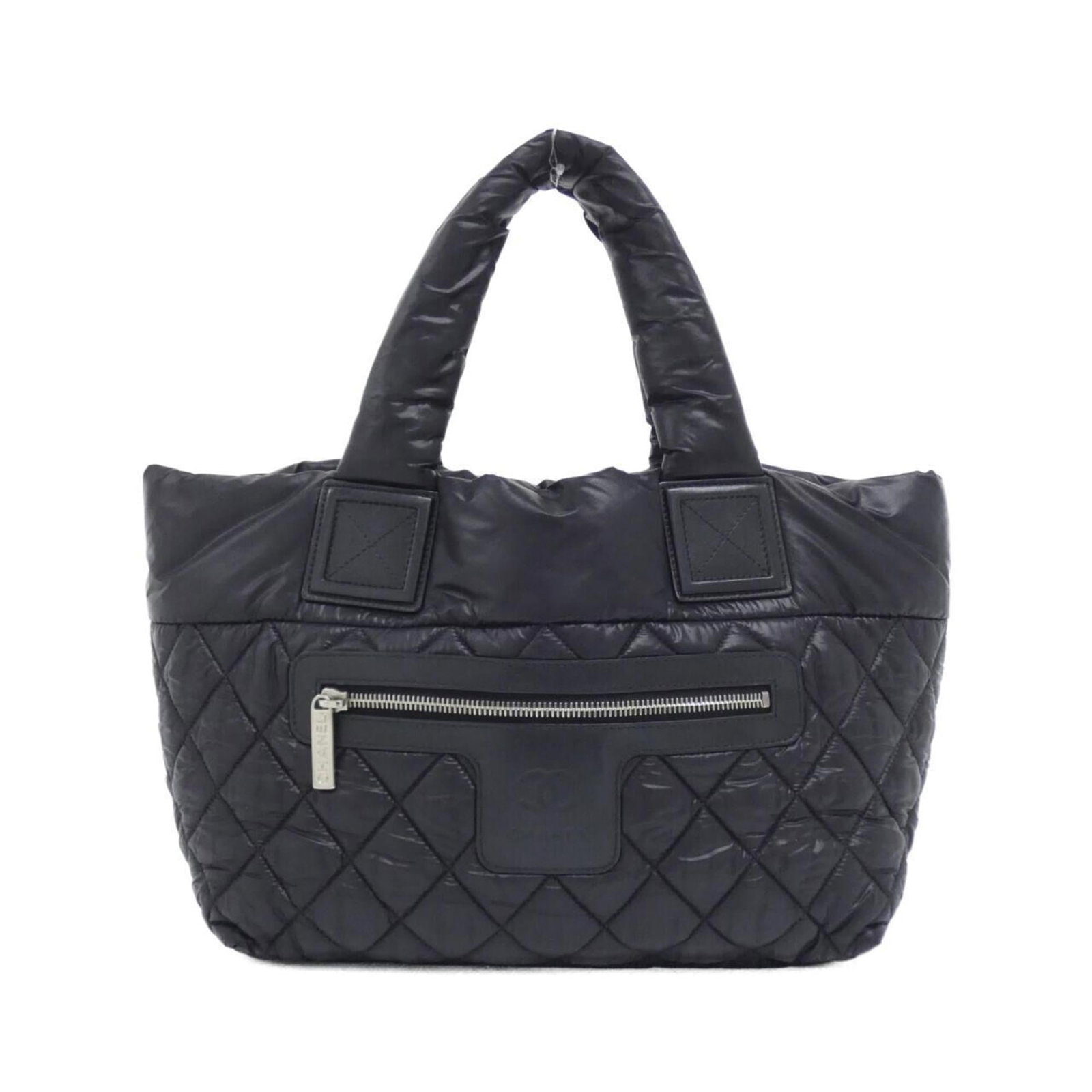 Nylon Handbag Chanel: Nylon Handbag Chanel Nylon Handbag Chanel, a stylish and versatile accessory in black. Made from durable nylon, this handbag measures 24cm x 28cm x 15cm, making it the perfect size for daily use.