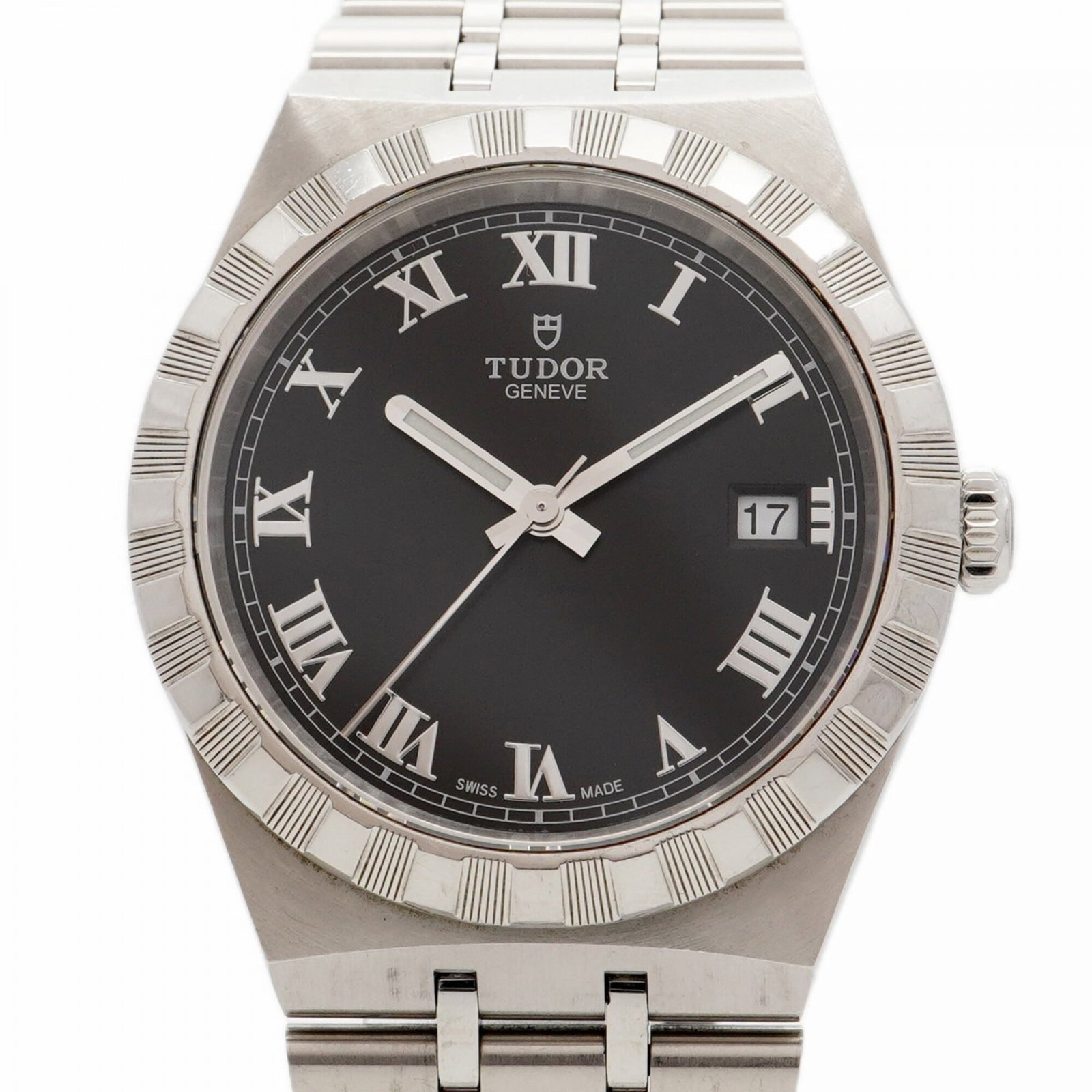 Tudor Wristwatch: Tudor Wristwatch Stainless steel band adds durability to this black dial Tudor wristwatch, featuring a 38mm case diameter. The watch has visible traces of usage and minor scratches, but remains in