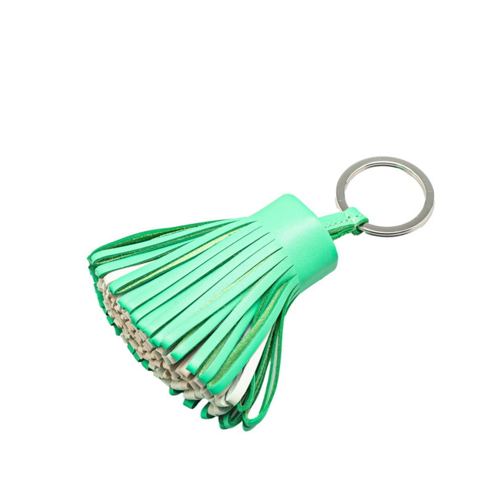 Agneau Keyring Hermes Milo: Agneau Keyring Hermes Milo Agneau Milo keyring from Hermes, featuring a unique material and design. This used item shows some traces of usage with minor scratches and dirt, but remains in very good