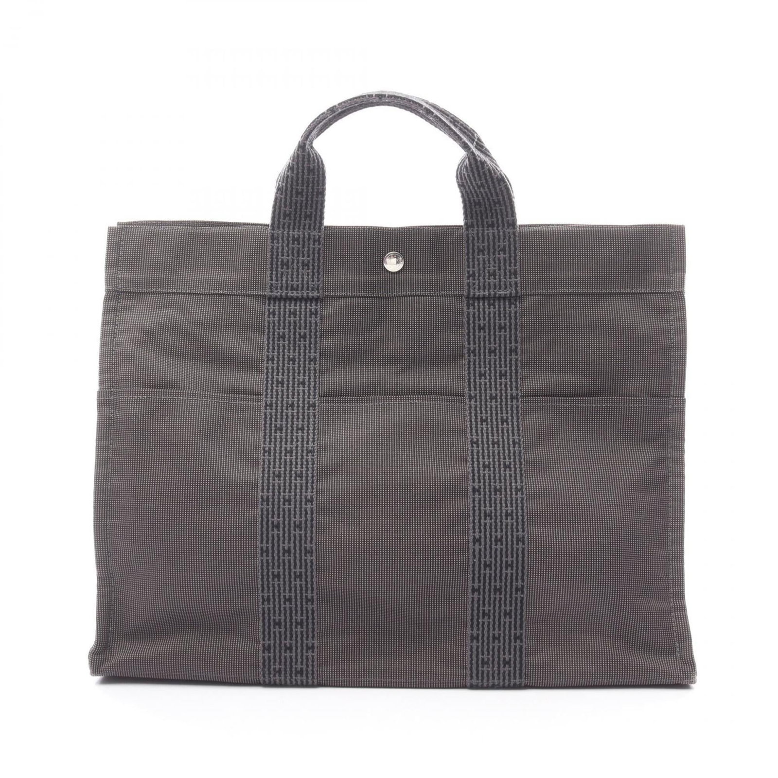 Handbag Tote Bag Canvas Handbag: Handbag Tote Bag Canvas Handbag Canvas Handbag in Gray. This used canvas handbag from Hermes measures 32cm x 42cm x 11cm and features a versatile gray color. With some traces of usage, it retains its