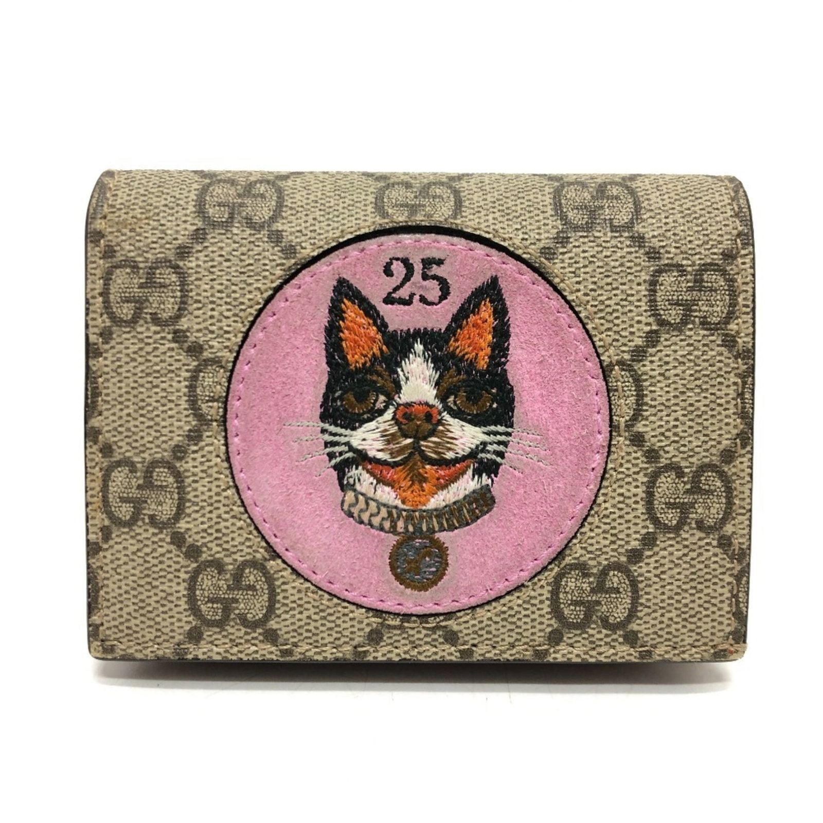 Canvas gg supreme bi fold wallet: Canvas gg supreme bi fold wallet Canvas GG Supreme bi-fold wallet in beige and red, featuring the iconic Gucci design. This used wallet has traces of usage and minor scratches, but remains in good