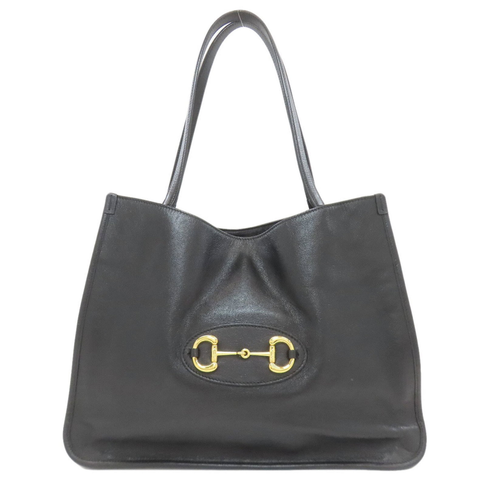 Tote Bag Leather by Gucci: Tote Bag Leather by Gucci Black leather tote bag by Gucci, measuring 26cm x 33cm x 13.5cm, with a few traces of usage and some scratches / dirt visible but overall in very good condition. This