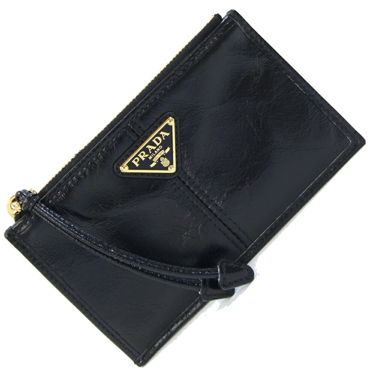 Prada Card Wallet Leather: Prada Card Wallet Leather Black leather card wallet from Prada, measuring 8cm x 13.5cm, with a few traces of usage and some scratches/dirt visible but overall in very good condition. This used card