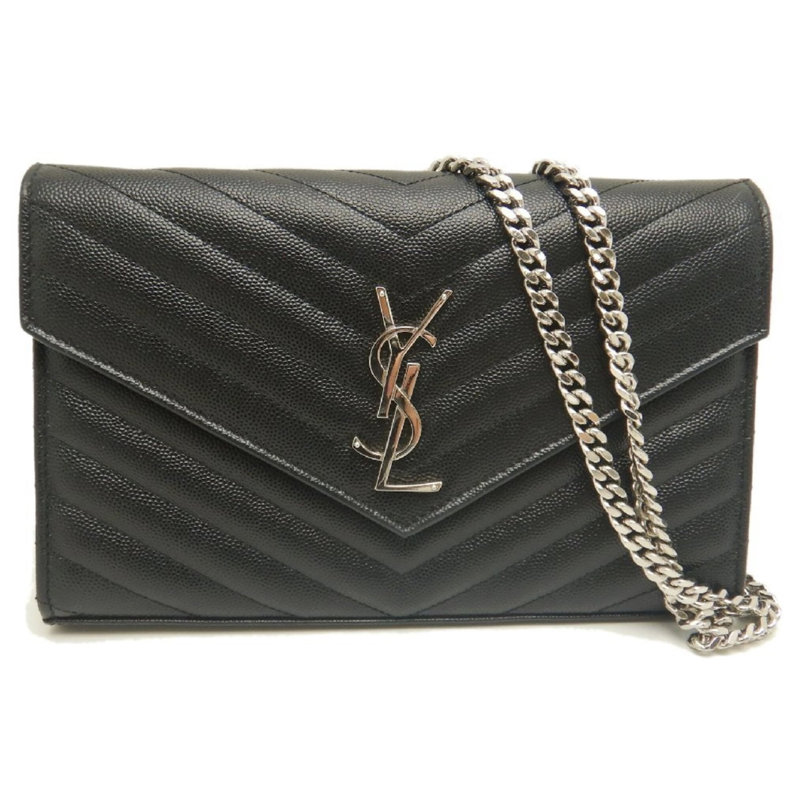 Yves Saint Laurent Chain/ Shoulder Wallet Leather: Yves Saint Laurent Chain/ Shoulder Wallet Leather Chain/Shoulder Wallet in Black Leather. This Yves Saint Laurent design features a sleek chain strap and a compact leather body, perfect for adding a
