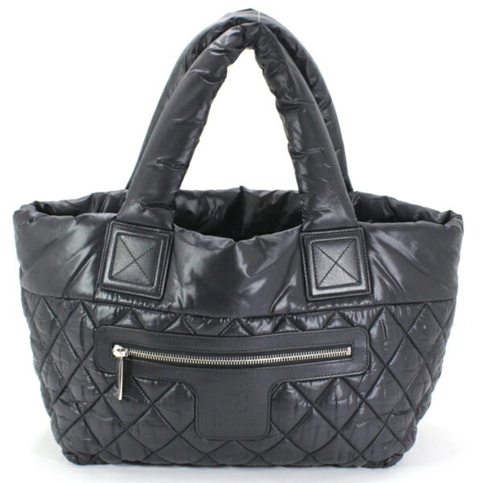 Nylon Handbag Tote Bag by Chanel: Nylon Handbag Tote Bag by Chanel Nylon Handbag Tote Bag by Chanel, featuring a classic design with a black and Bordeaux color combination. Made from durable nylon material, this tote bag measures 24cm