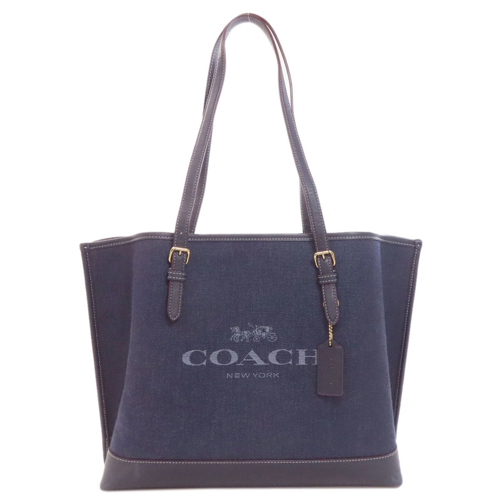 Tote Bag Coach Denim: Tote Bag Coach Denim Blue Coach Denim Tote Bag, 28cm x 41cm x 13cm. This used tote bag features a durable denim material and bears a signature. With some traces of usage visible, it remains in very