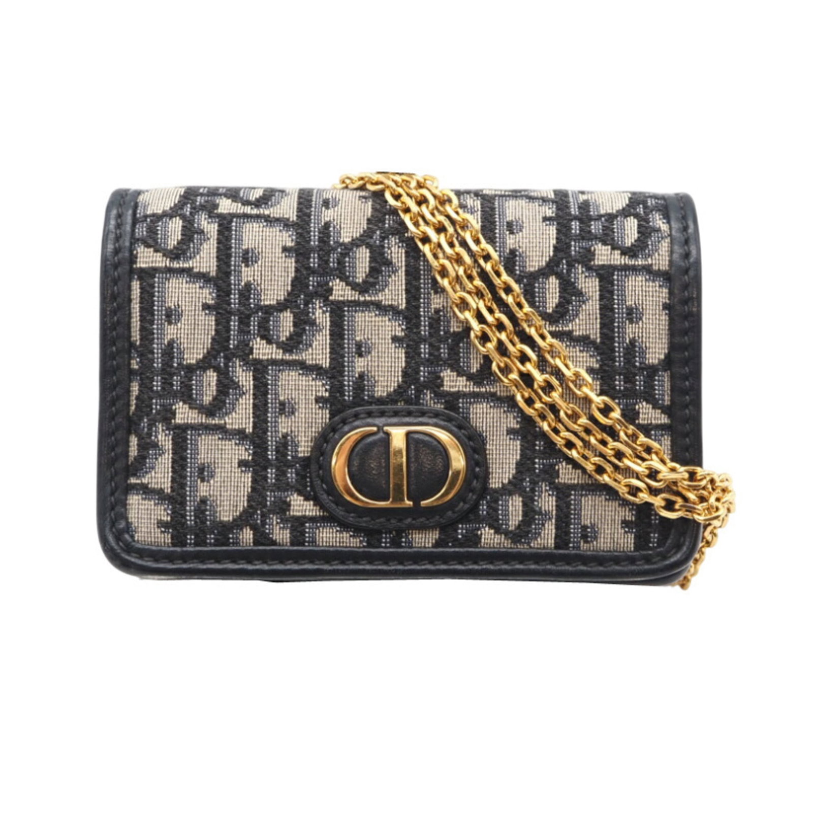 Shoulder Bag Canvas Christian Dior Pouch: Shoulder Bag Canvas Christian Dior Pouch Navy canvas shoulder bag with a classic Christian Dior design, featuring a small pouch attached to the front. The bag measures 9cm x 13.5cm x 5cm and has