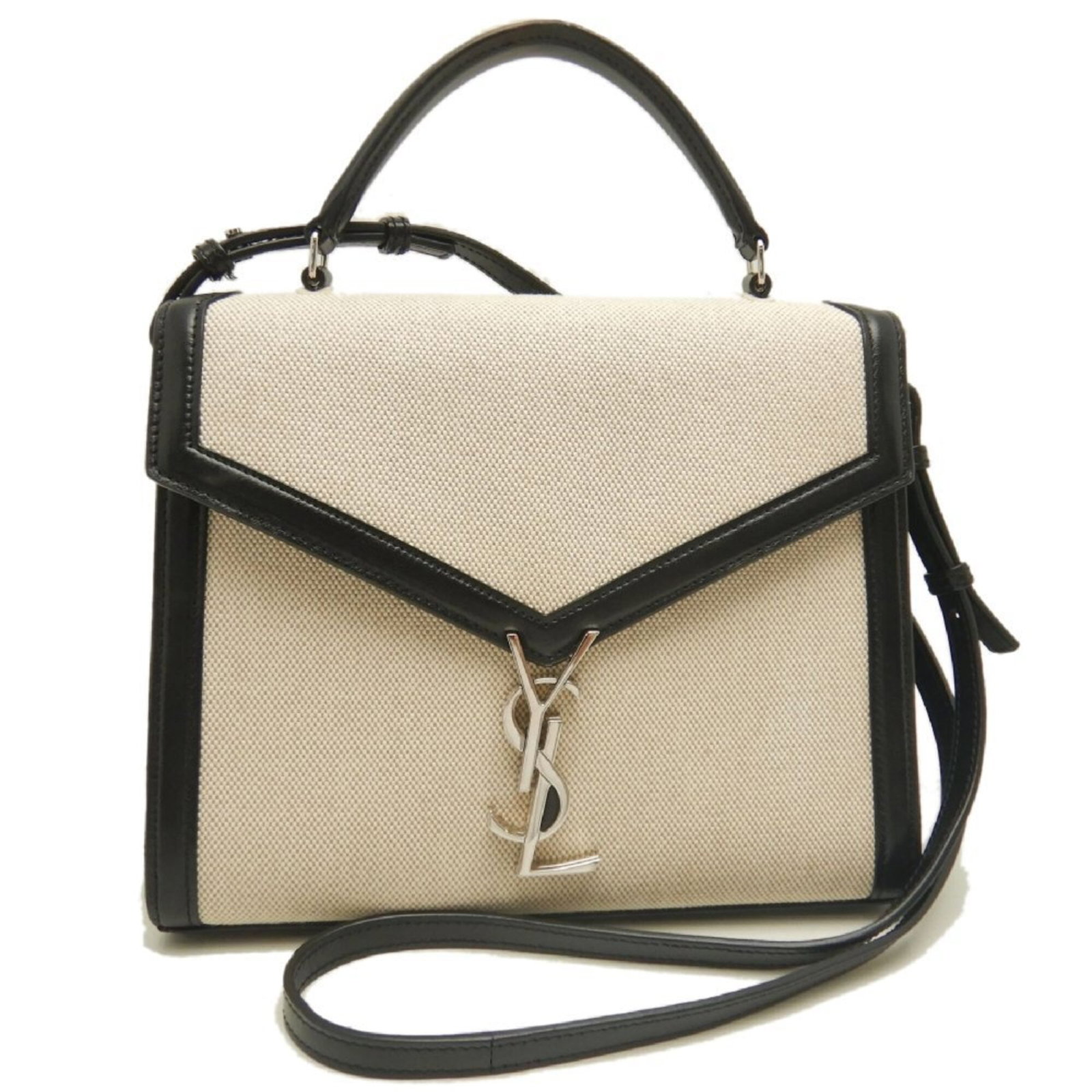 Canvas Handbag Leather By Saint Laurent: Canvas Handbag Leather By Saint Laurent Canvas Handbag Leather by Saint Laurent - A Timeless Classic. This beige and black canvas handbag features high-quality leather accents, silver hardware, and a