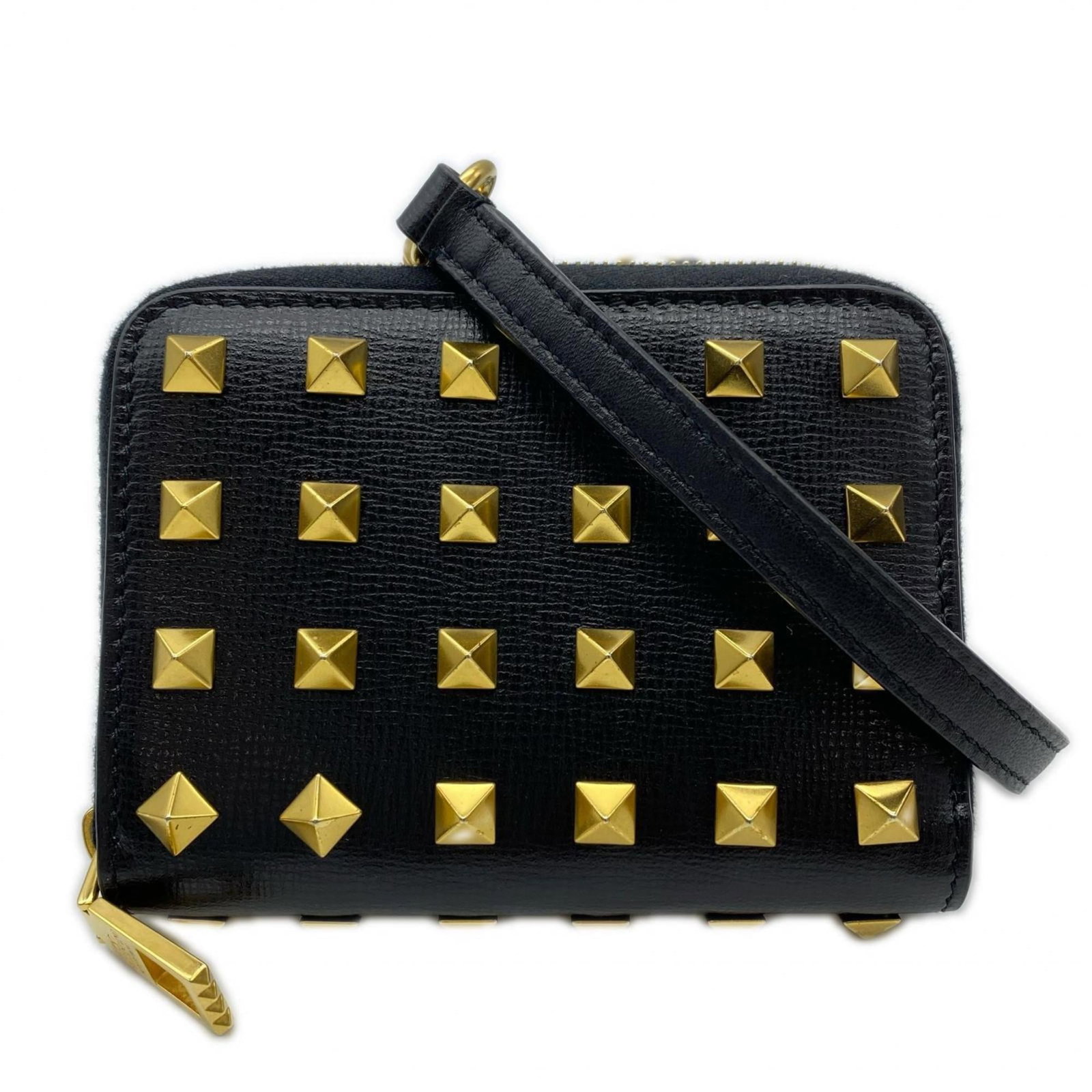 Valentino Shoulder Bag Leather: Valentino Shoulder Bag Leather This black leather shoulder bag from Valentino features clean lines and a classic design. With its small size and sleek shape, it's perfect for adding a touch of