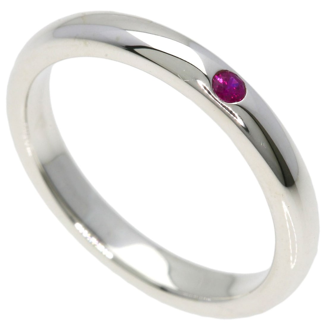 Ruby ring band stacking silver Tiffany Co: Ruby ring band stacking silver Tiffany Co Silver Tiffany Co ring band stacking piece with a ruby main stone, available in size 4.5(US). This elegant design showcases the beauty of silver and a