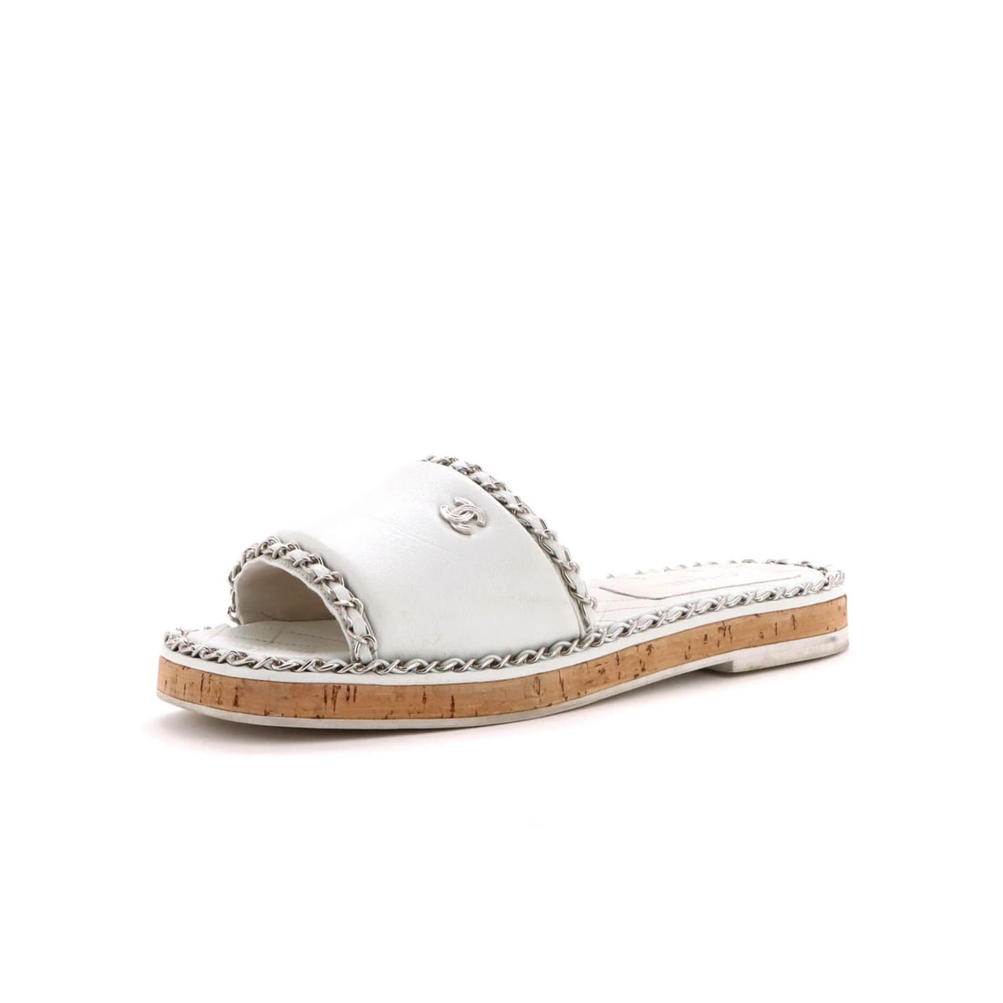 Chain slide sandals leather cork women's Chanel: Chain slide sandals leather cork women's Chanel White leather and cork chain slide sandals from Chanel, featuring a neutral exterior color. Minor creasing and scuffs are present throughout, with
