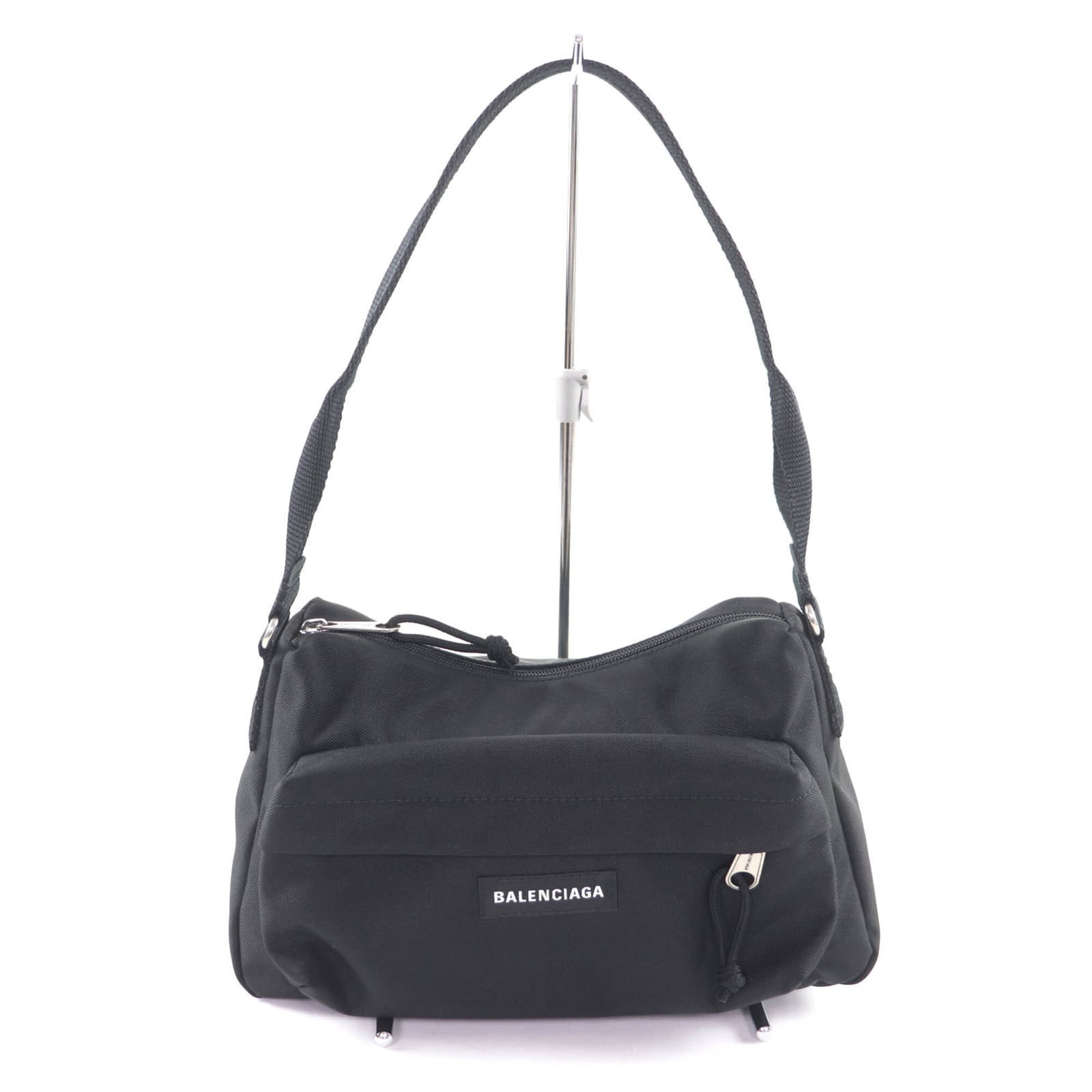 Shoulder Bag Nylon By Balenciaga: Shoulder Bag Nylon By Balenciaga Black nylon shoulder bag from Balenciaga, measuring 19cm x 33cm x 7cm. This mint condition, used item boasts a sleek design and durable nylon material. In excellent