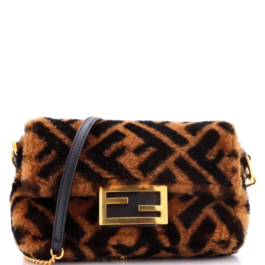 Baguette NM Bag Shearling Zucca Fendi Mini: Baguette NM Bag Shearling Zucca Fendi Mini The Fendi Baguette NM Zucca Shearling Mini is a stylish cross body bag with a rich brown shearling exterior and black interior. Noted for its compact size,