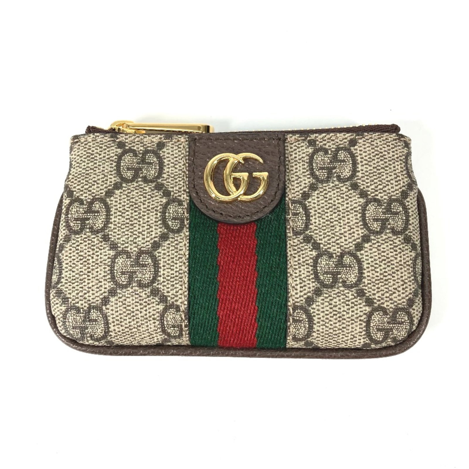 Gucci Keycase Other: Gucci Keycase Other Gucci Keycase in Beige, featuring a classic design with subtle elegance. This compact case measures 12.5cm x 7cm and 4.9cm x 2.8cm, making it the perfect accessory for everyday use