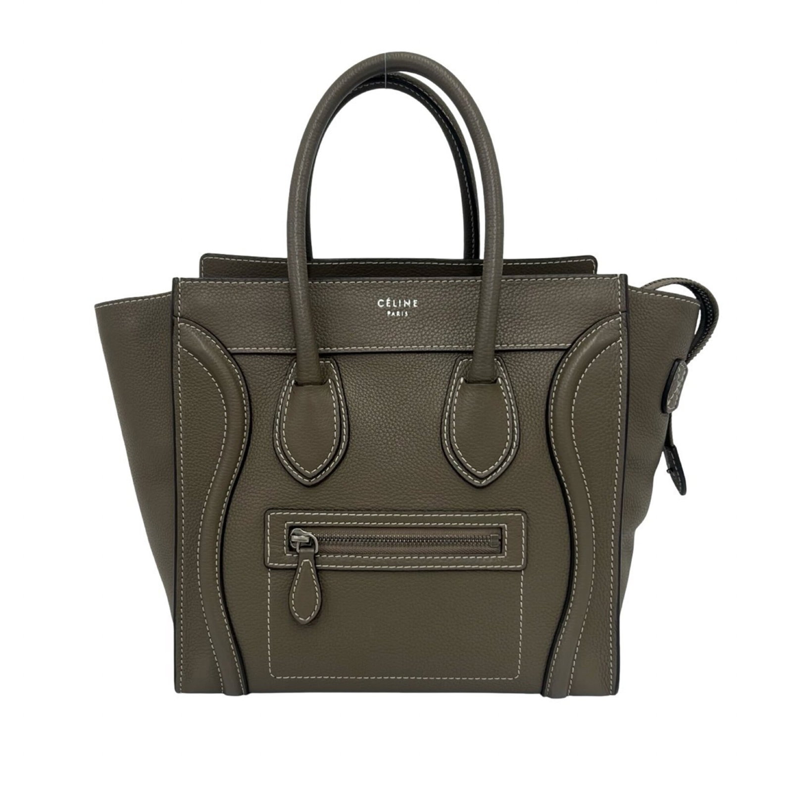 Celine leather tote bag: Celine leather tote bag This beige leather tote bag from Celine features a classic design with clean lines and a timeless aesthetic. Made from high-quality leather, it has developed a beautiful