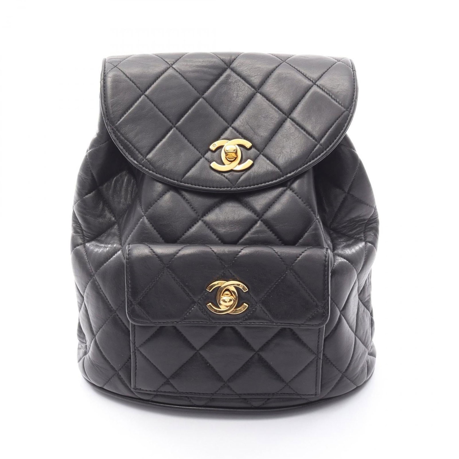 Leather Backpack by Chanel: Leather Backpack by Chanel Black lambskin leather backpack with a classic design, featuring a timeless black color and premium material. This Chanel backpack has been well-cared for and shows only