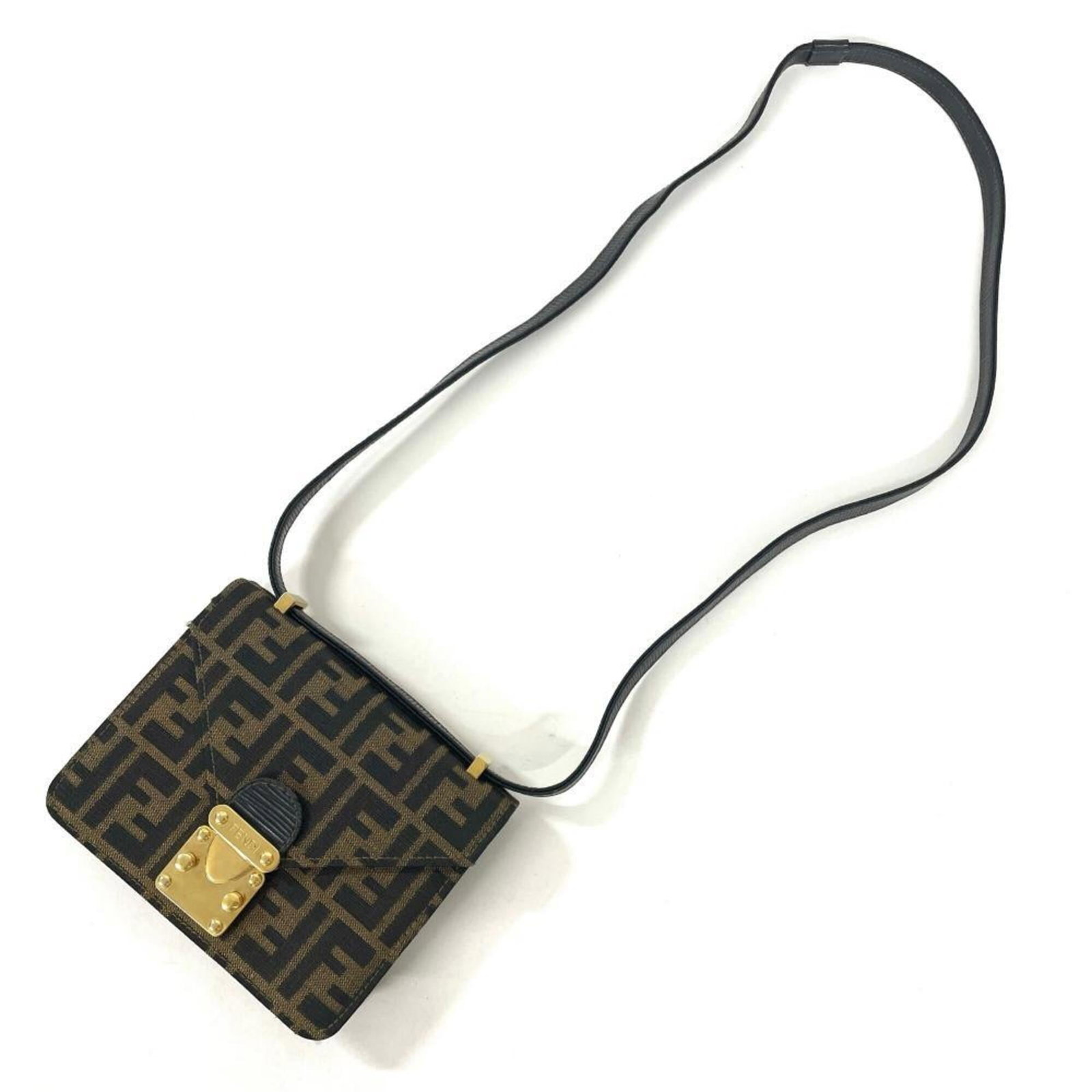 Canvas shoulder bag by Fendi: Canvas shoulder bag by Fendi Brown canvas shoulder bag by Fendi, measuring 13cm x 17.5cm x 4cm, features a classic design with traces of usage and minor scratches/dirt visible in good condition. The b