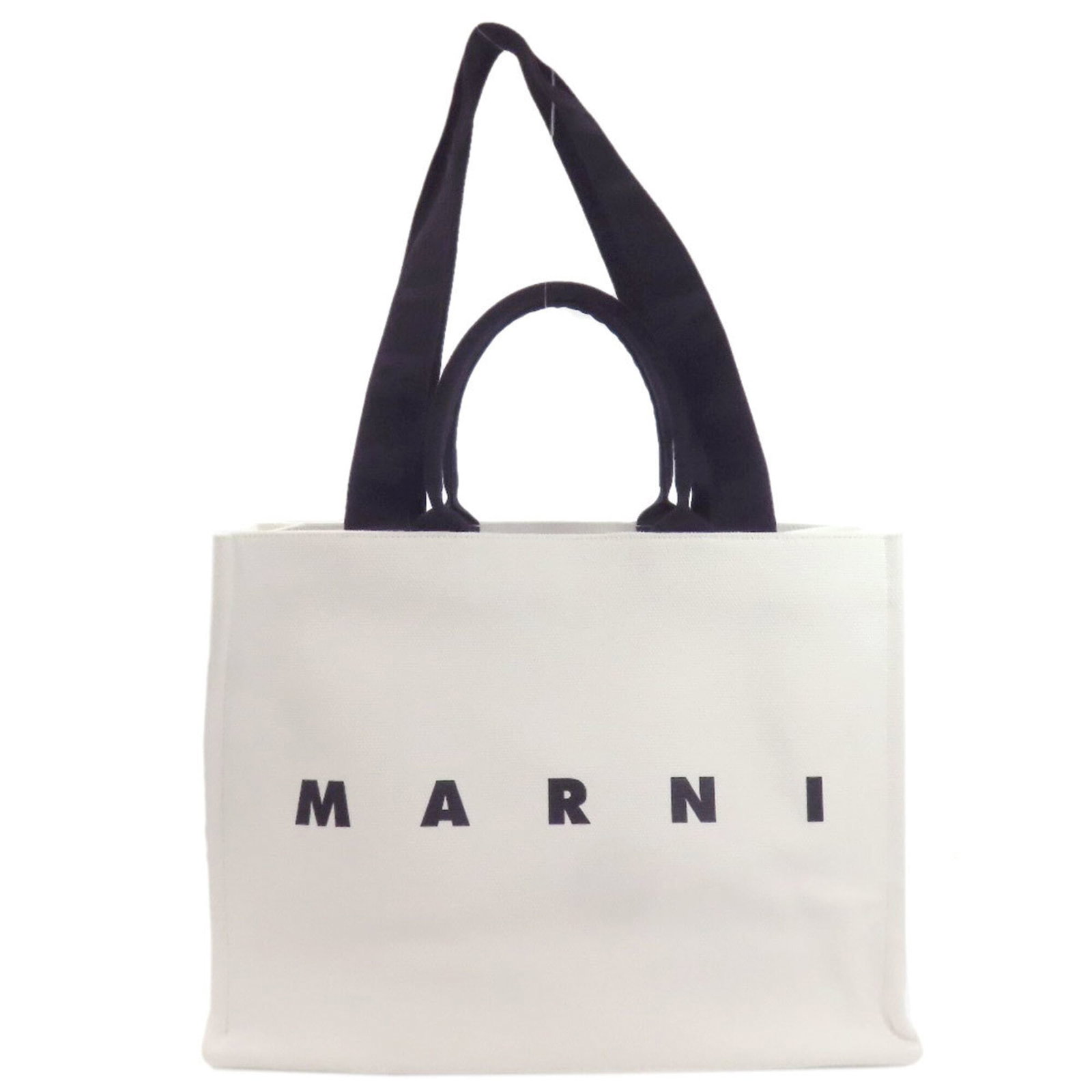 Marni tote bag canvas: Marni tote bag canvas Canvas tote bag from Marni, featuring black and white colors. The bag measures 34cm x 46cm x 18cm and has a few traces of usage with some scratches and dirt visible. It is in ver