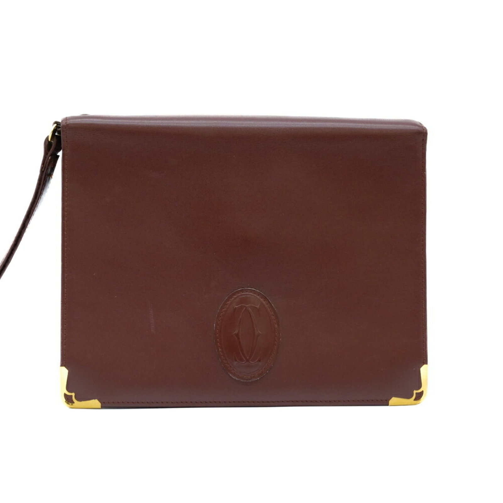 Bag clutch leather Cartier: Bag clutch leather Cartier Cartier leather clutch bag in Bordeaux and Red colors, with a classic design and timeless elegance. Measuring 17cm x 22cm x 6cm, it features high-quality leather with some t