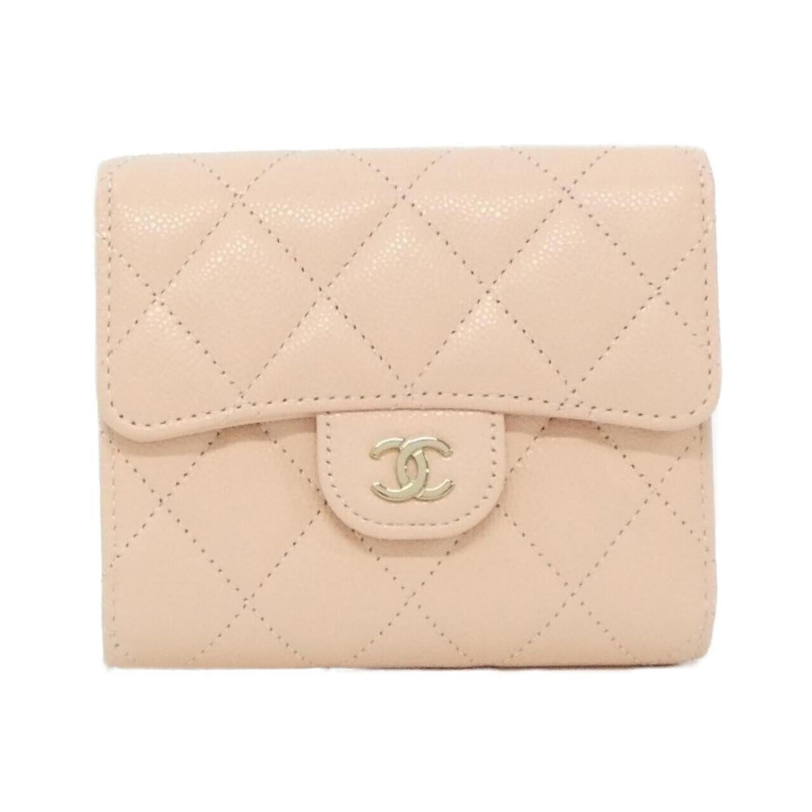 Calfskin Tri Fold Wallet Grained: Calfskin Tri Fold Wallet Grained Pink Grained Calfskin Tri Fold Wallet with a subtle sheen, bearing a few traces of usage and minor scratches. Its classic design and timeless elegance make it a