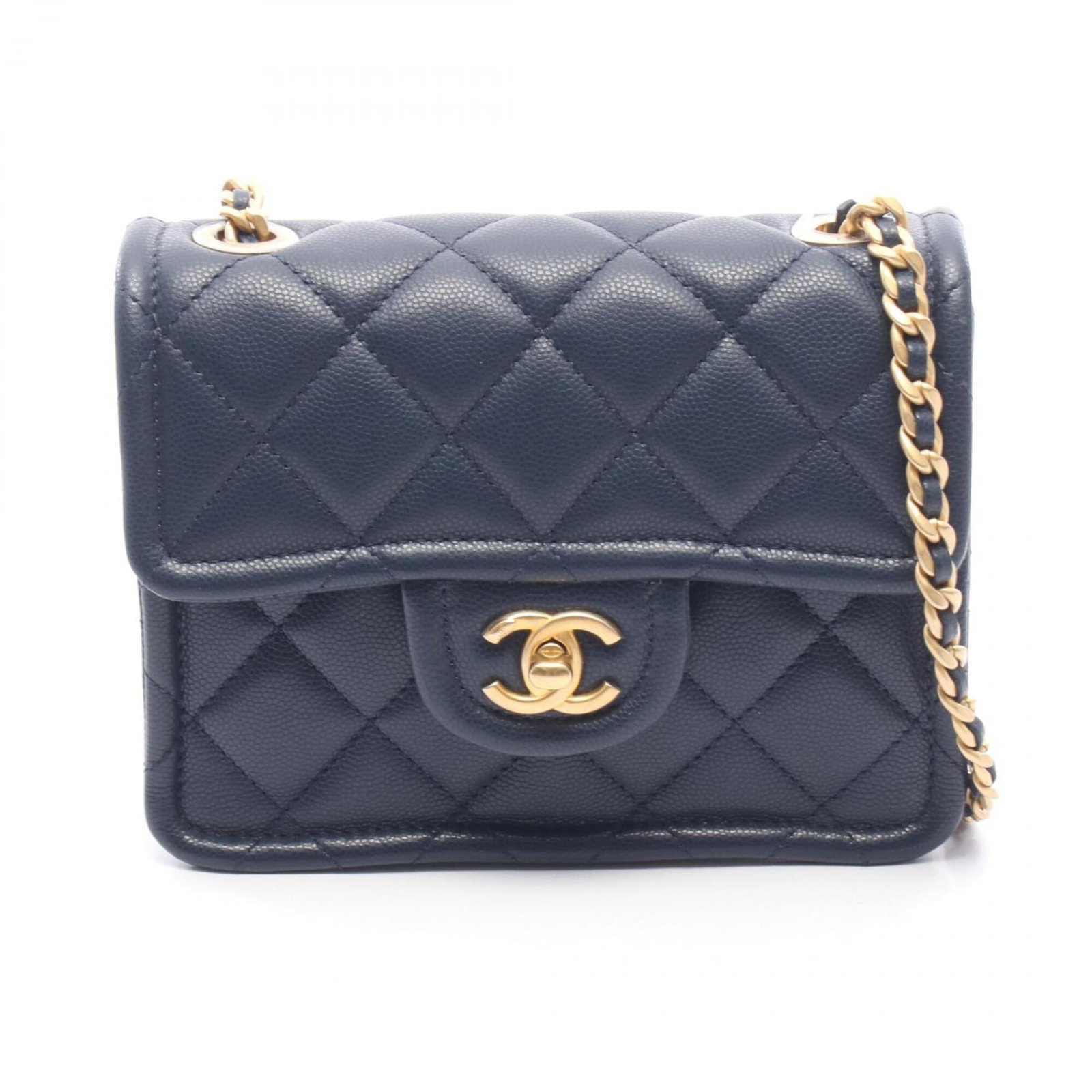 Chanel handbag calfskin shoulder bag: Chanel handbag calfskin shoulder bag Navy calfskin shoulder bag with gold hardware, featuring a classic Chanel design. This pre-owned handbag boasts its original grained leather exterior and sturdy