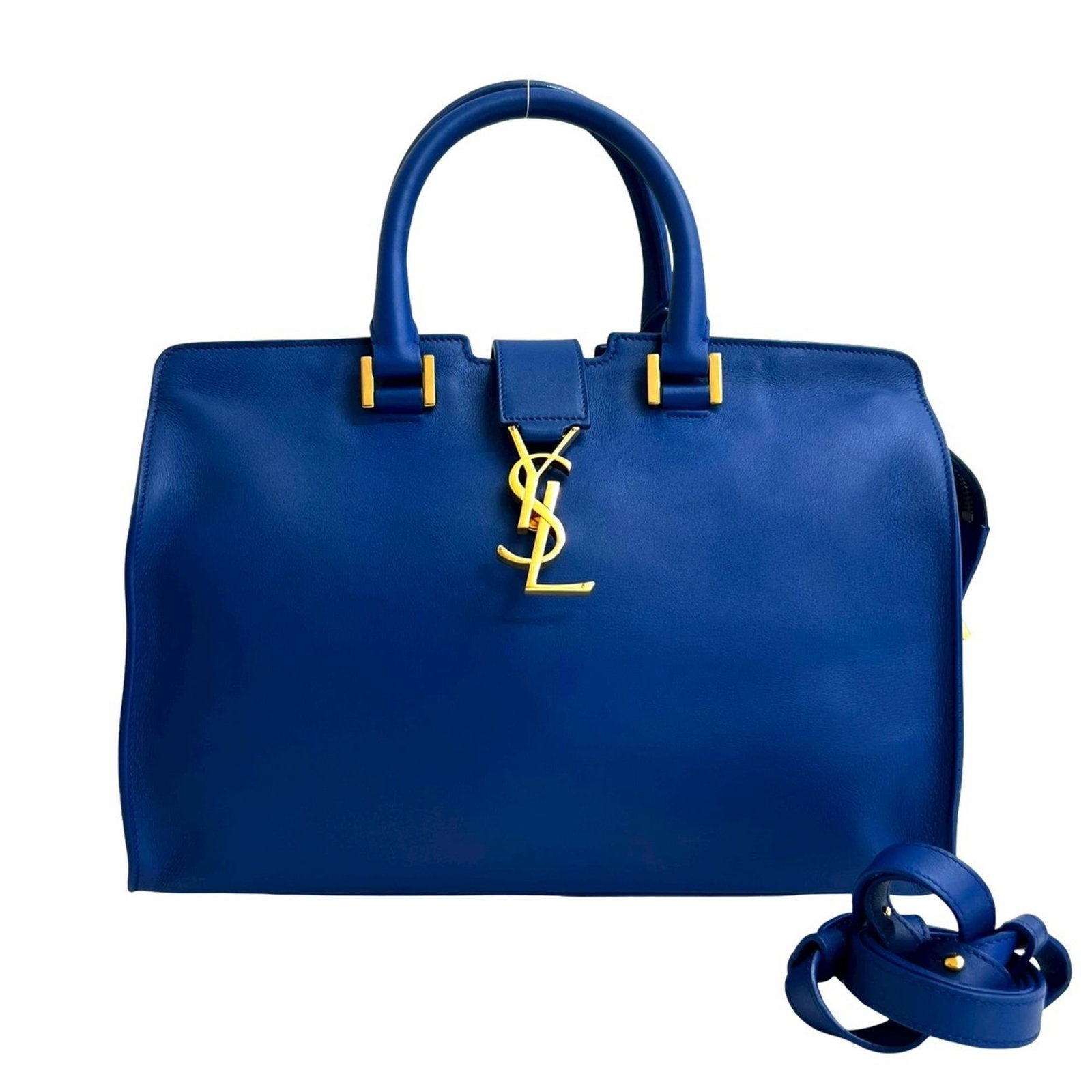 Yves Saint Laurent Handbag Shoulder Bag Leather: Yves Saint Laurent Handbag Shoulder Bag Leather This Yves Saint Laurent shoulder bag features a stunning blue leather exterior with subtle signs of wear, giving it a unique, pre-loved charm. Made from