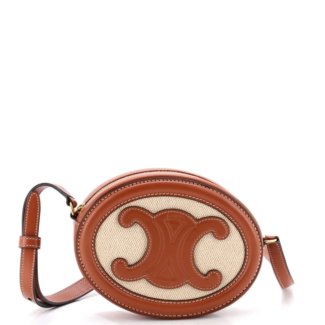 Celine Triomphe Oval Crossbody Bag Canvas and Leather: Celine Triomphe Oval Crossbody Bag Canvas and Leather The Celine Triomphe Oval Crossbody Bag Canvas and Leather features a timeless design with clean lines, perfect for everyday use. With its neutral