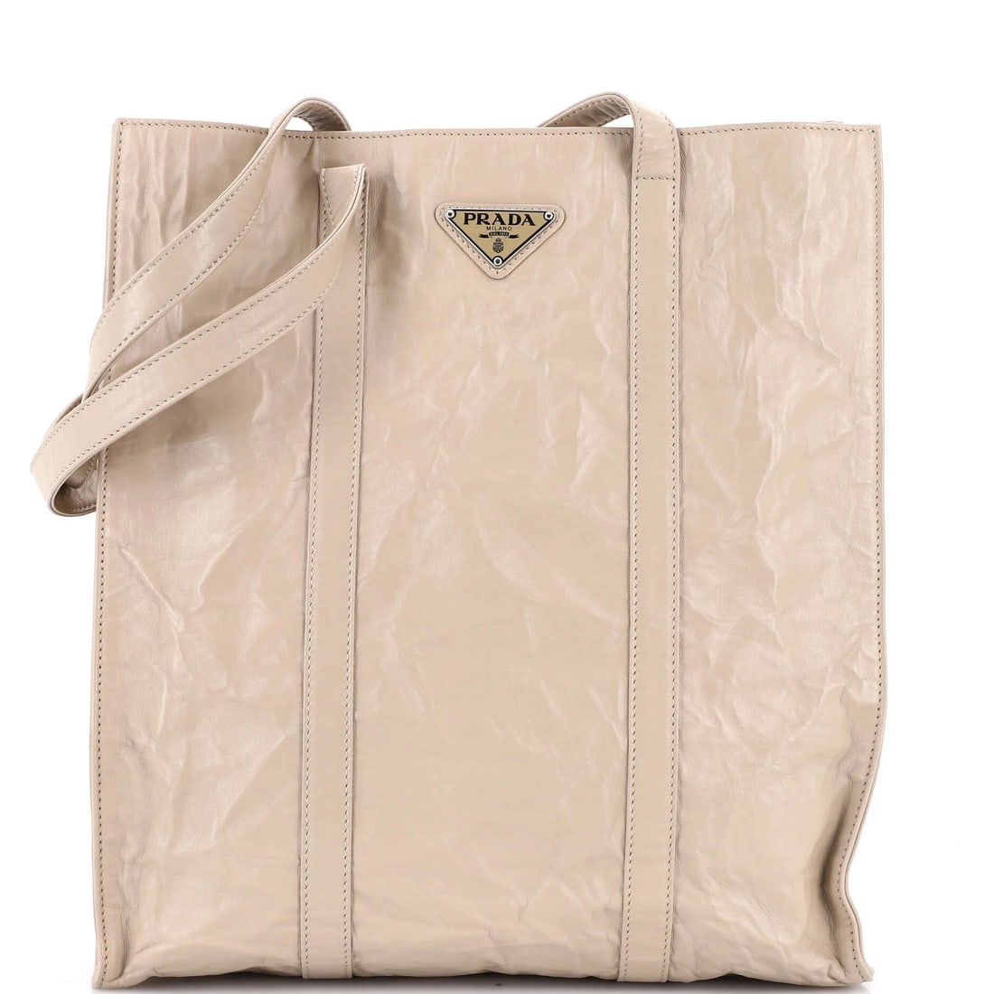 Antique nappa tote shopper medium Prada: Antique nappa tote shopper medium Prada Medium Prada Shopper Tote in Neutral Leather, featuring classic nappa exterior with subtle creases and corner wear. The interior boasts matching neutral