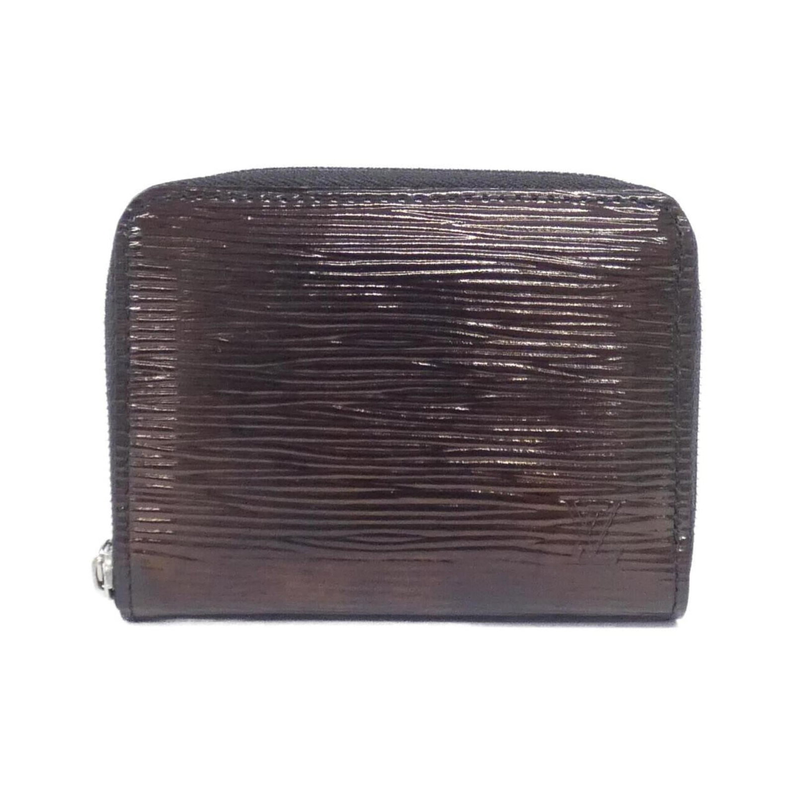 Coin purse leather case by Louis Vuitton: Coin purse leather case by Louis Vuitton Black leather coin purse case by Louis Vuitton, featuring enamel details and a classic design. Made from high-quality leather with a few traces of usage visibl