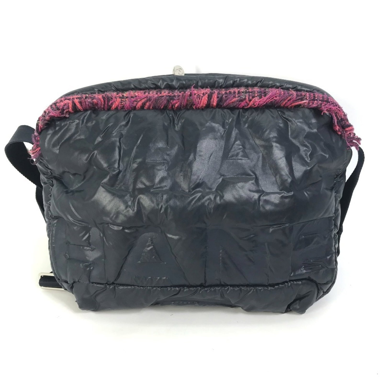 Tweed Nylon Chanel Fanny Pack Bag Shoulder: Tweed Nylon Chanel Fanny Pack Bag Shoulder Navy and Pink Tweed Nylon Chanel Fanny Pack Bag Shoulder features a unique blend of tweed and nylon materials, adding an edgy touch to its classic design.