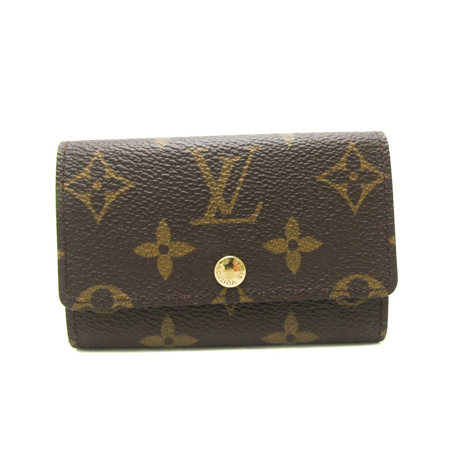 Monogram Keycase Louis Vuitton: Monogram Keycase Louis Vuitton Monogram Keycase Louis Vuitton features the iconic monogram pattern, a classic design staple from the renowned French fashion house. With its snap closure and six key ho