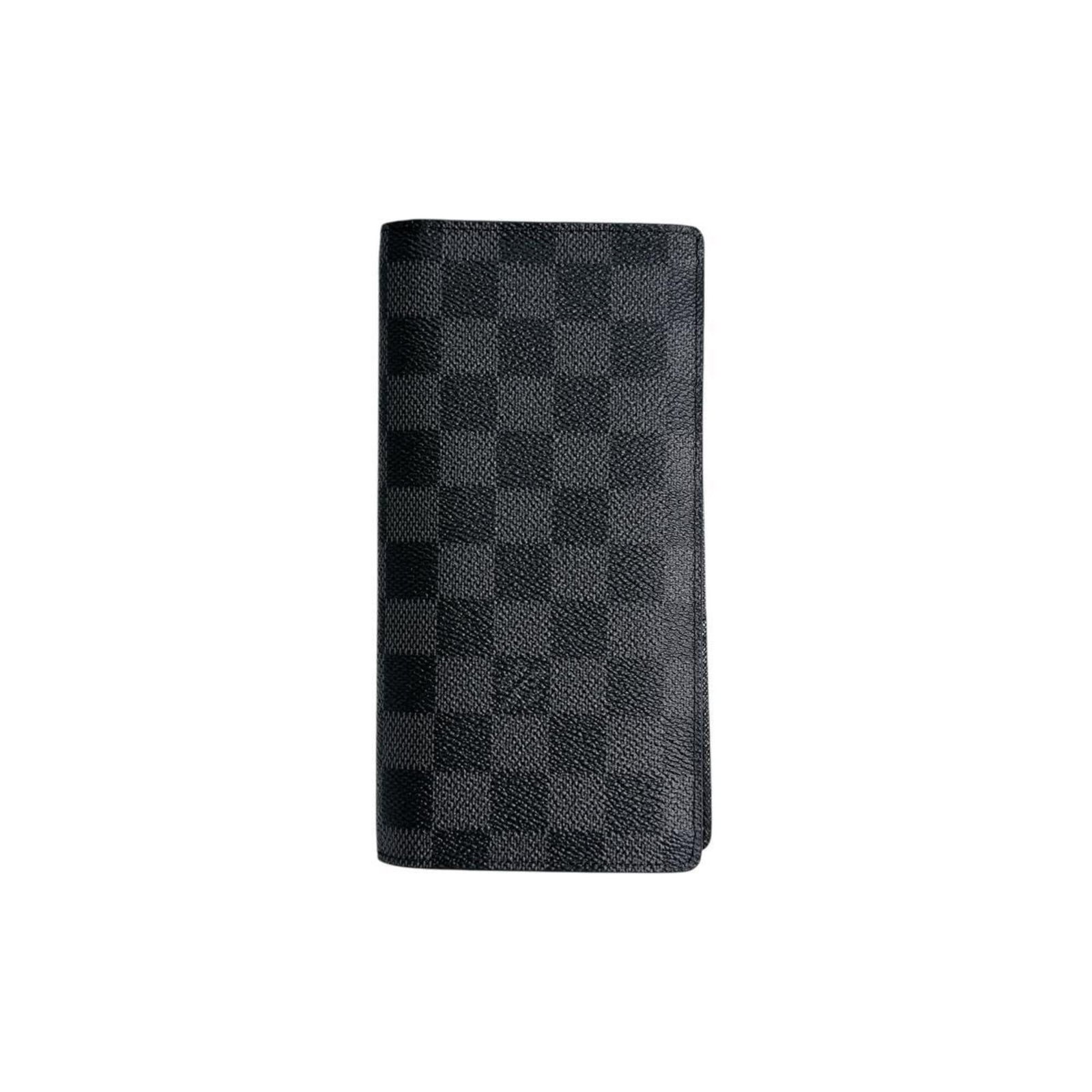 Louis Vuitton Long Wallet (Bi-Fold) Damier Graphite: Louis Vuitton Long Wallet (Bi-Fold) Damier Graphite The Louis Vuitton Long Wallet (Bi-Fold) in Damier Graphite features the iconic brand's signature black and gray pattern, a classic design staple.