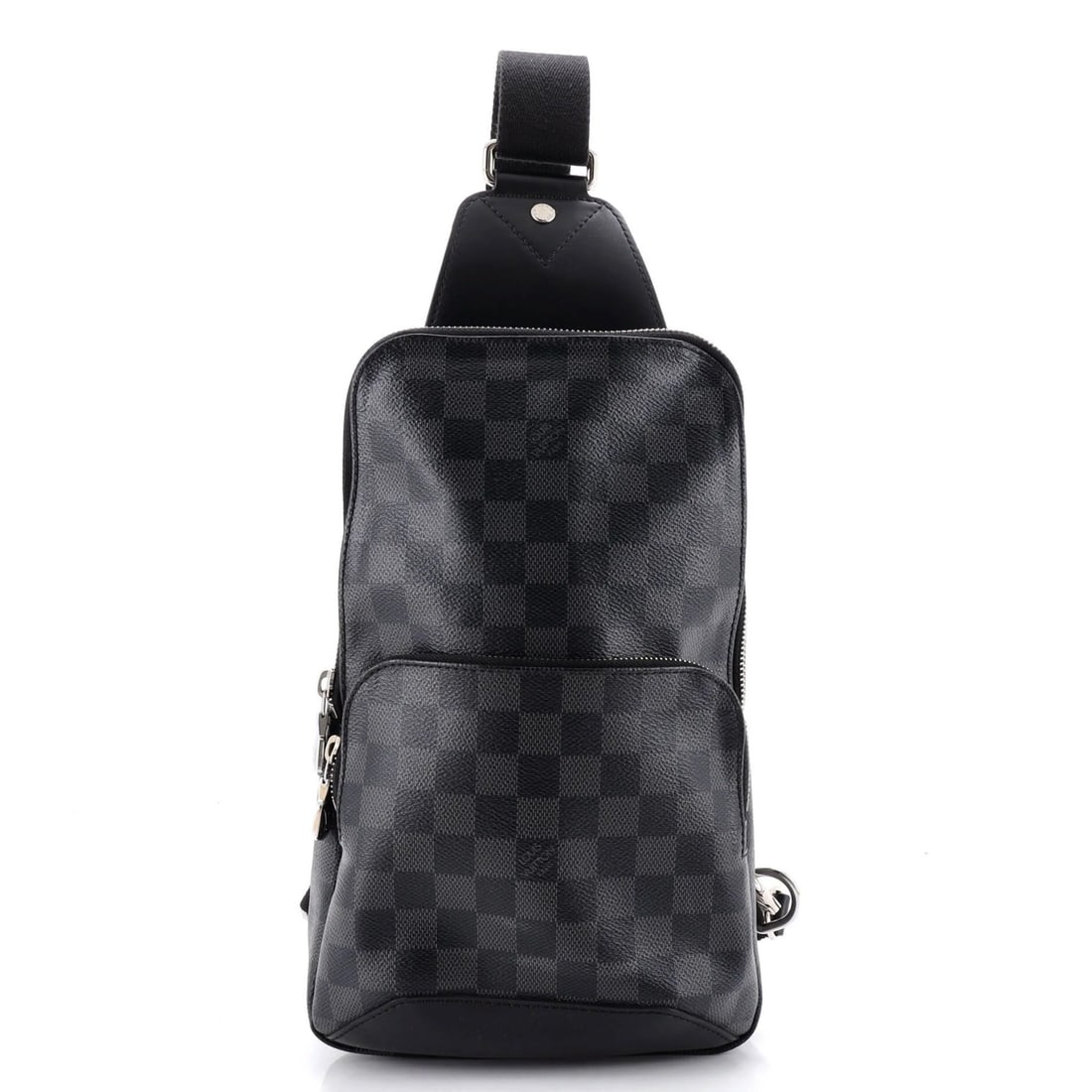 Damier Graphite Sling Bag by Louis Vuitton: Damier Graphite Sling Bag by Louis Vuitton Black Damier Graphite canvas coated sling bag by Louis Vuitton, featuring a classic cross body design with a moderate odor in the interior. The exterior