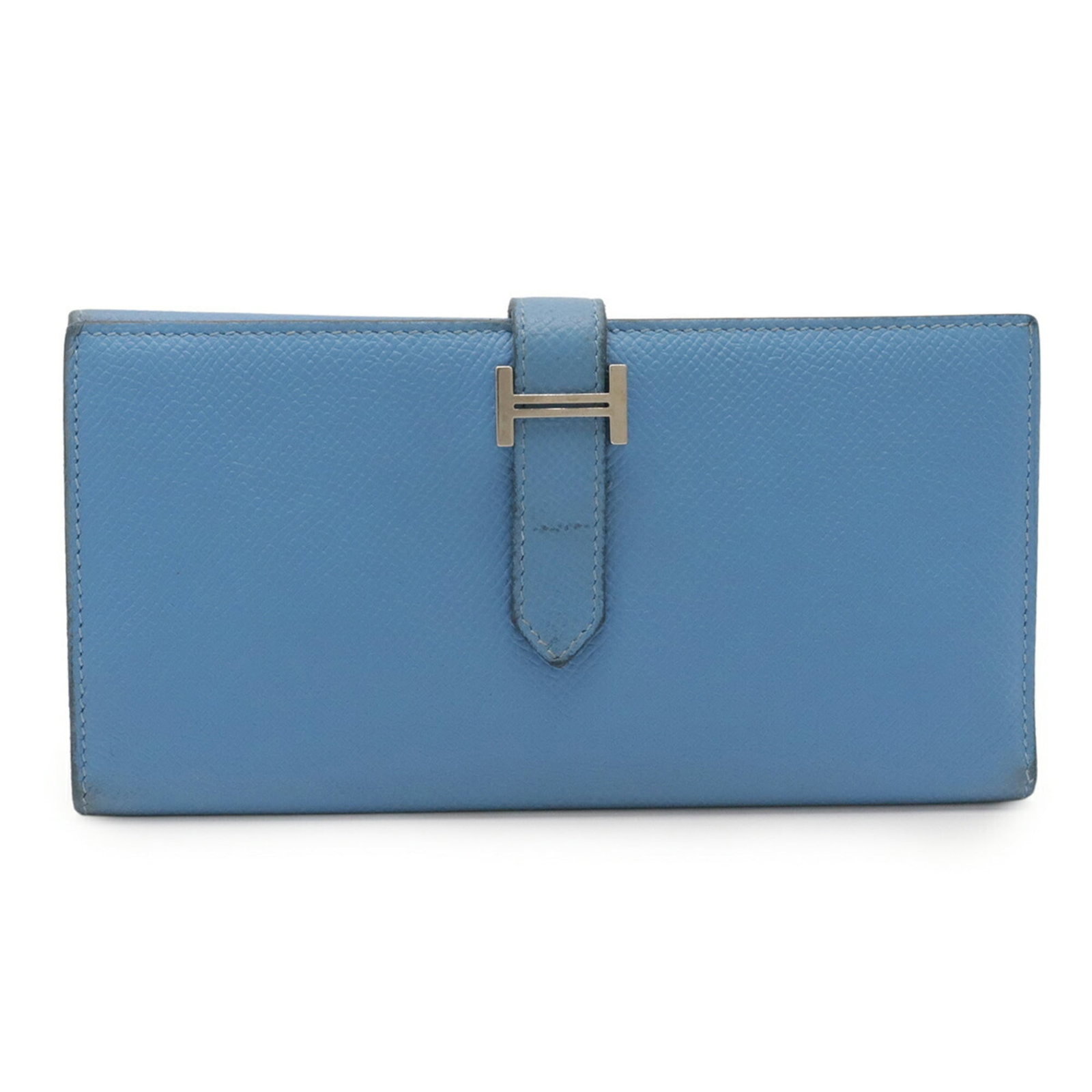 Epsom Leather Tri Fold Wallet By Hermes: Epsom Leather Tri Fold Wallet By Hermes Epsom Leather Tri Fold Wallet by Hermes boasts a classic design with a timeless blue paradise hue. The tri-fold structure and high-quality Epsom leather