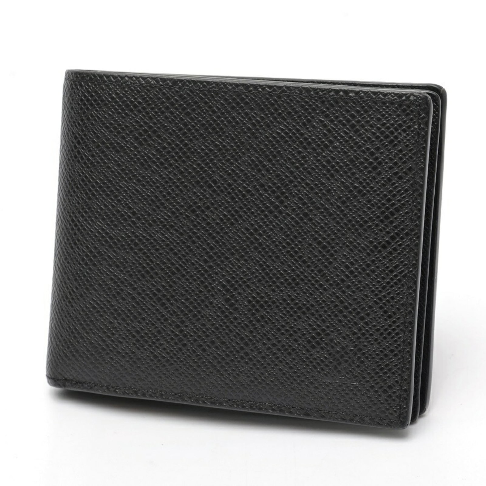 Louis Vuitton Coin Purse/ Coin Case Taiga Leather: Louis Vuitton Coin Purse/ Coin Case Taiga Leather The Louis Vuitton Coin Purse/ Coin Case Taiga Leather features sleek black taiga leather and a compact design, making it a stylish accessory for every