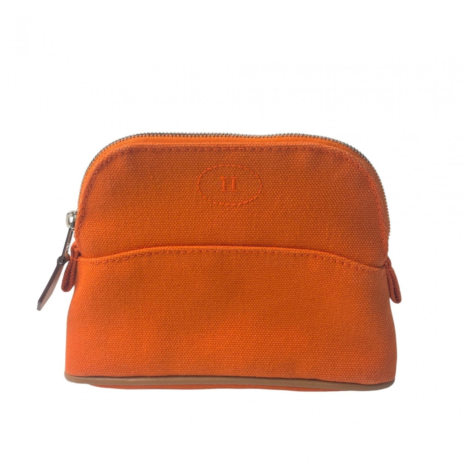 Canvas pouch by Hermes: Canvas pouch by Hermes Canvas pouch by Hermes, in mint condition with a vibrant orange color and compact 10cm x 16cm design. Weighing just 69g, this canvas pouch is both stylish and portable. A like