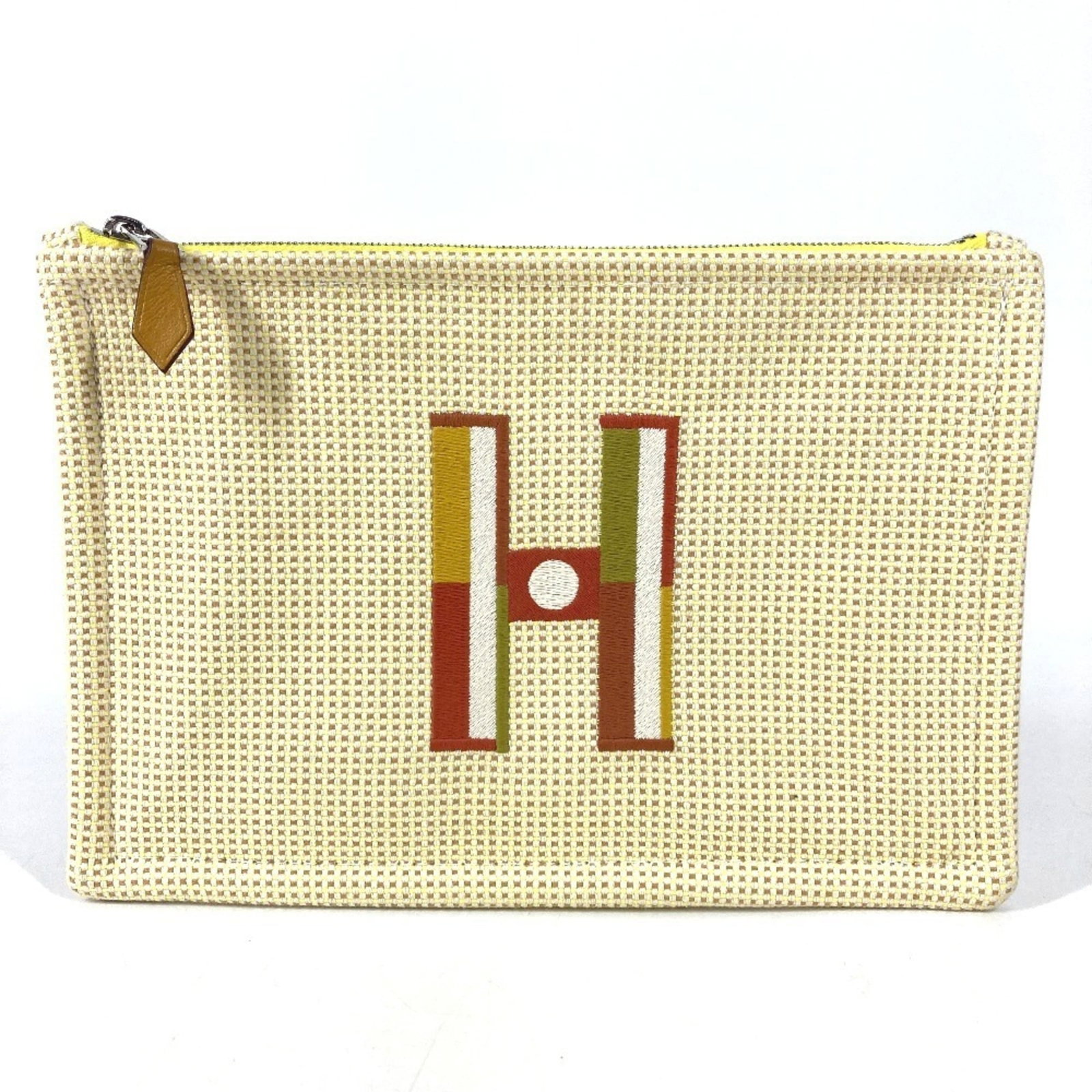 Handbag Embroidery Pouch Clutch Bag: Handbag Embroidery Pouch Clutch Bag Yellow embroidery clutch bag with a unique design, measuring 15cm x 23cm. This used item has hardly any traces of usage and is in very good condition, making it a g