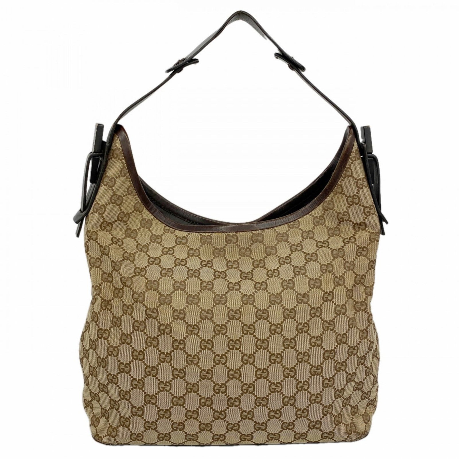Shoulder Bag Canvas Gucci: Shoulder Bag Canvas Gucci Canvas Gucci shoulder bag in beige and brown, featuring silver hardware. This used canvas bag has traces of usage with scratches and dirt, but remains generally in good condi