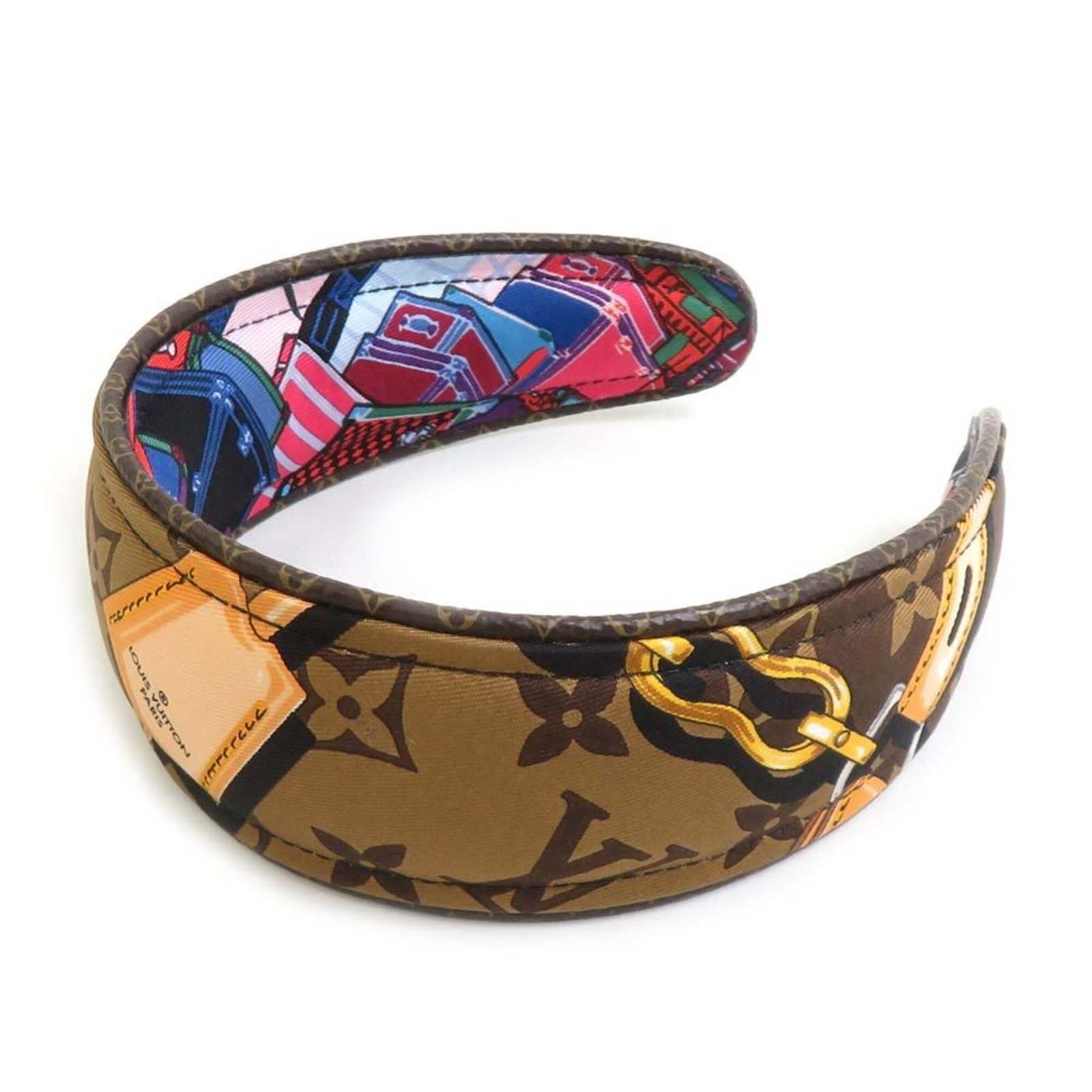 Louis Vuitton Headband: Louis Vuitton Headband This Louis Vuitton headband boasts a vibrant multi-color design, adding a pop of personality to any outfit. With its durable construction and signature LV monogram pattern,