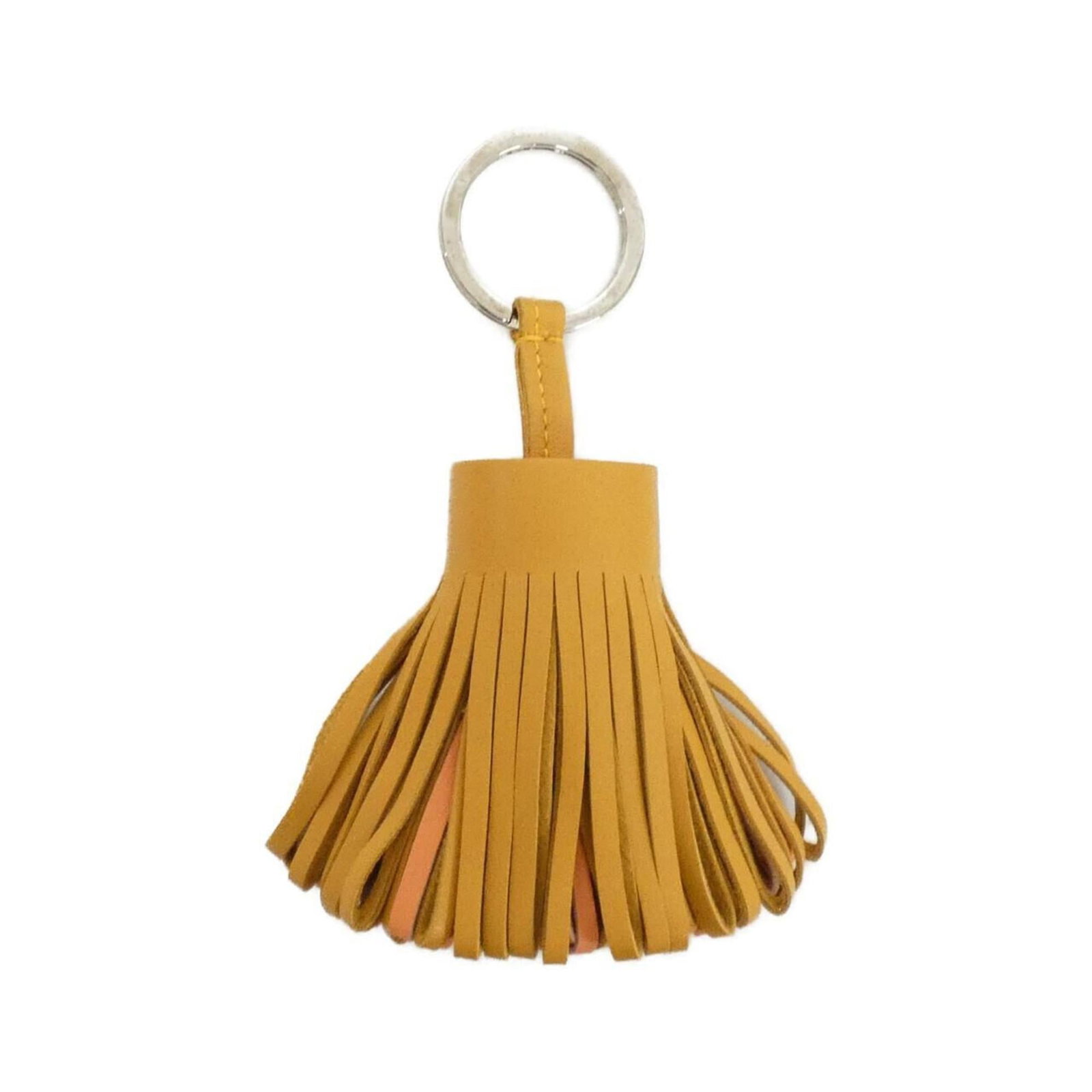 Agneau Keyring Hermes Milo: Agneau Keyring Hermes Milo Agneau Milo keyring from Hermes features a Crevette and Orange color combination, adding a touch of elegance to any accessory. With a few traces of usage visible, it still r