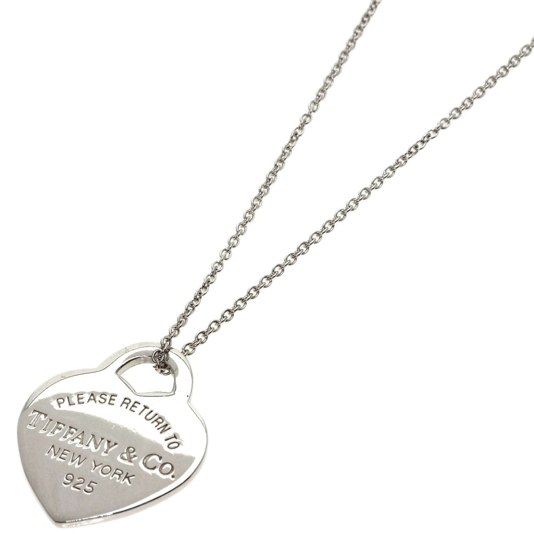 Return to Tiffany and Co silver necklace: Return to Tiffany and Co silver necklace Silver necklace from Return to Tiffany and Co, featuring a sleek design with no stone. Measuring 15.7 inches in length, it showcases the brand's signature