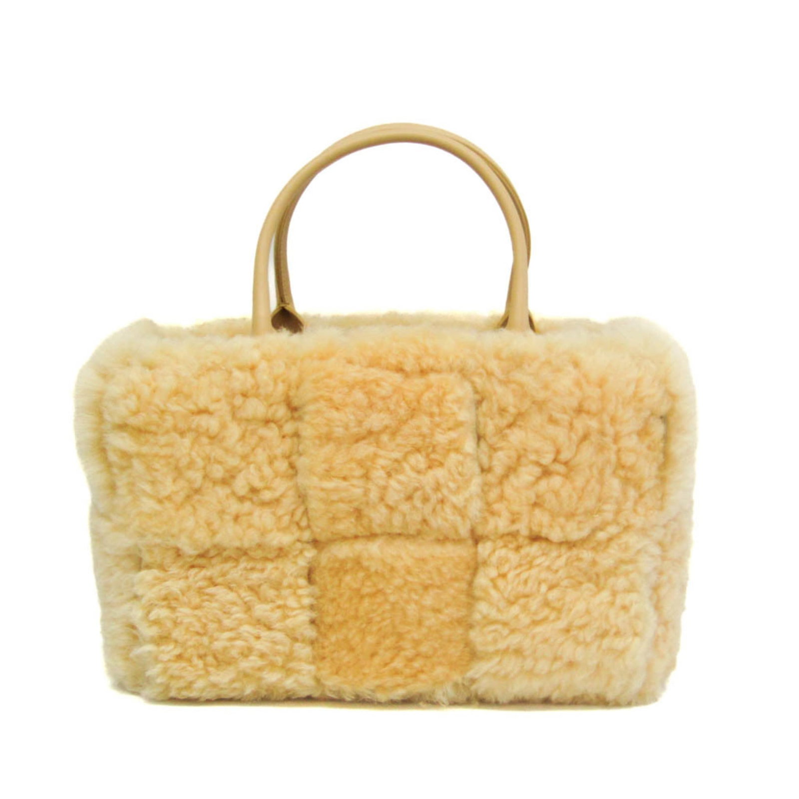 Fur Leather Tote Bag Bottega Veneta: Fur Leather Tote Bag Bottega Veneta Bottega Veneta's iconic fur leather tote bag boasts a vibrant yellow hue, complemented by the supple texture of its luxurious materials. The classic design
