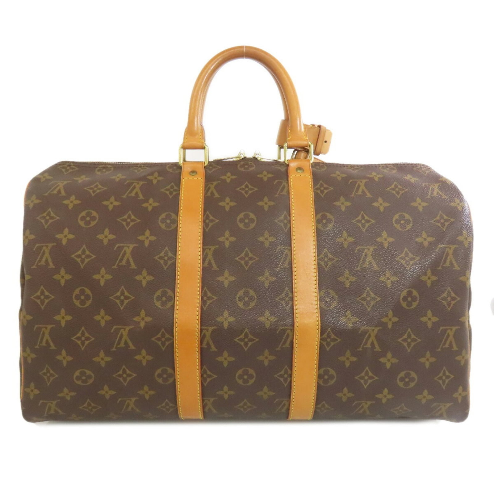 Vuitton Monogram Louis Boston Bag: Vuitton Monogram Louis Boston Bag The Vuitton Monogram Louis Boston Bag boasts its iconic monogram pattern, a timeless design element that adds sophistication to any outfit. Measuring 27cm x 46cm x 20