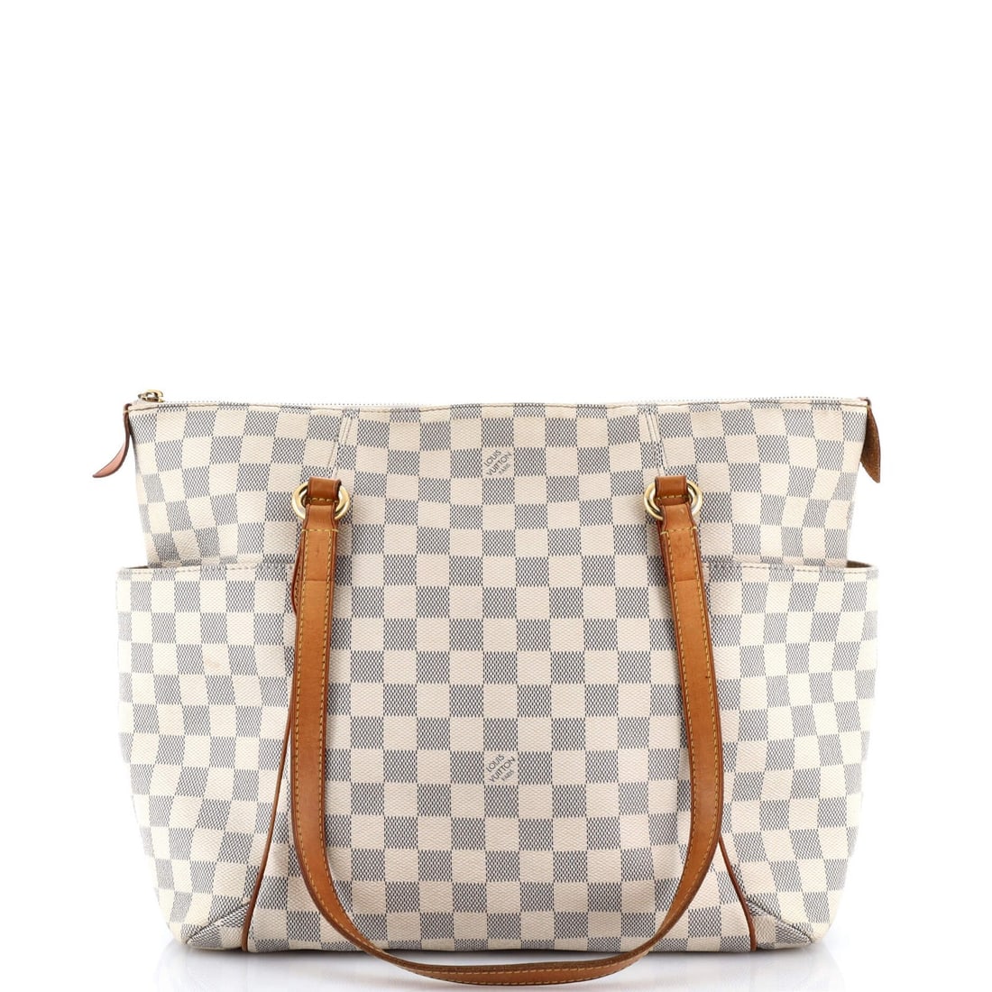 Totally Handbag Louis Vuitton Damier MM: Totally Handbag Louis Vuitton Damier MM Totally Handbag's Louis Vuitton Damier MM tote boasts a classic white canvas exterior with gold hardware, featuring the iconic Damier print. With its spacious
