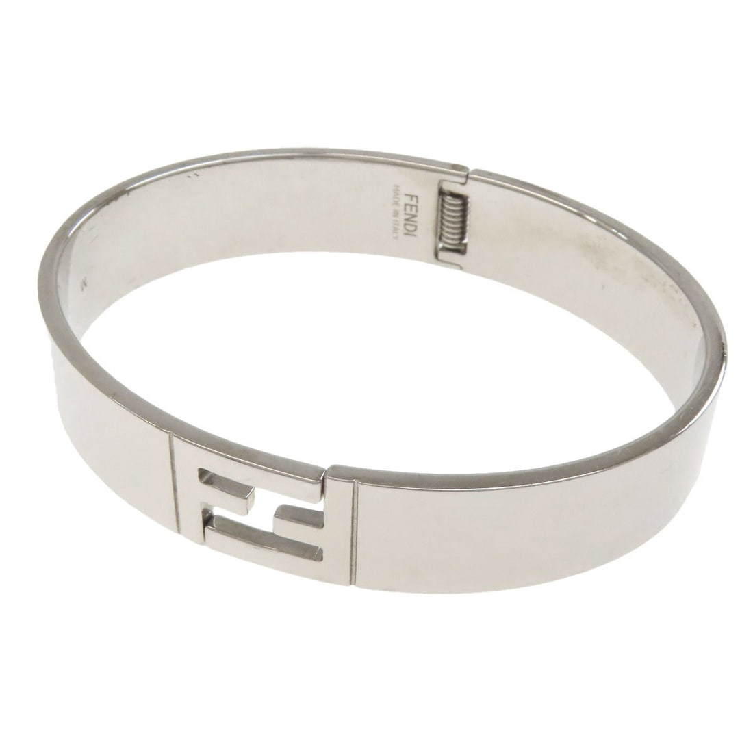 Metal Fendi Bangle Bracelet: Metal Fendi Bangle Bracelet Silver Metal Fendi Bangle Bracelet. This sleek metal bangle features the iconic Fendi style, crafted from high-quality silver metal. The elegant design makes it a stylish