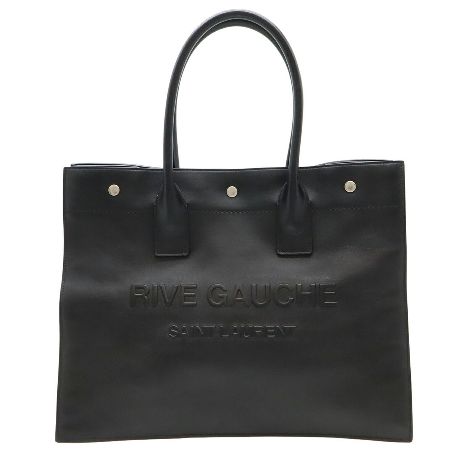 Saint Laurent Yves Tote Bag Leather: Saint Laurent Yves Tote Bag Leather Black leather Yves Saint Laurent tote bag with a classic shoulder strap, measuring 30.5cm x 38.5cm x 17.5cm. The bag shows signs of usage, including scratches and d
