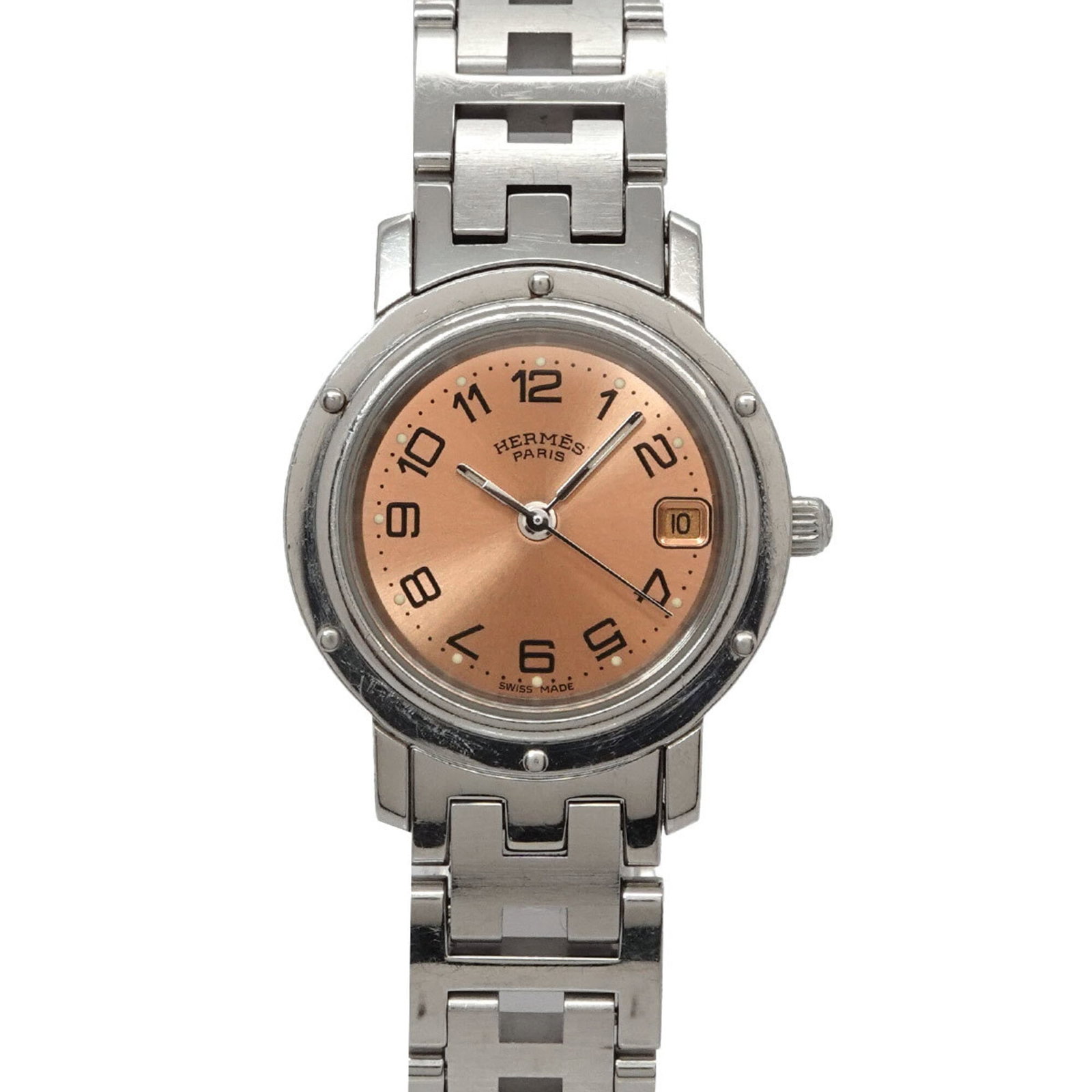Wristwatch by Hermes: Wristwatch by Hermes Stainless steel case and band add a sleek touch to this pink dial wristwatch, measuring 24mm in diameter. The watch features a classic design with a subtle wear, showcasing a few 