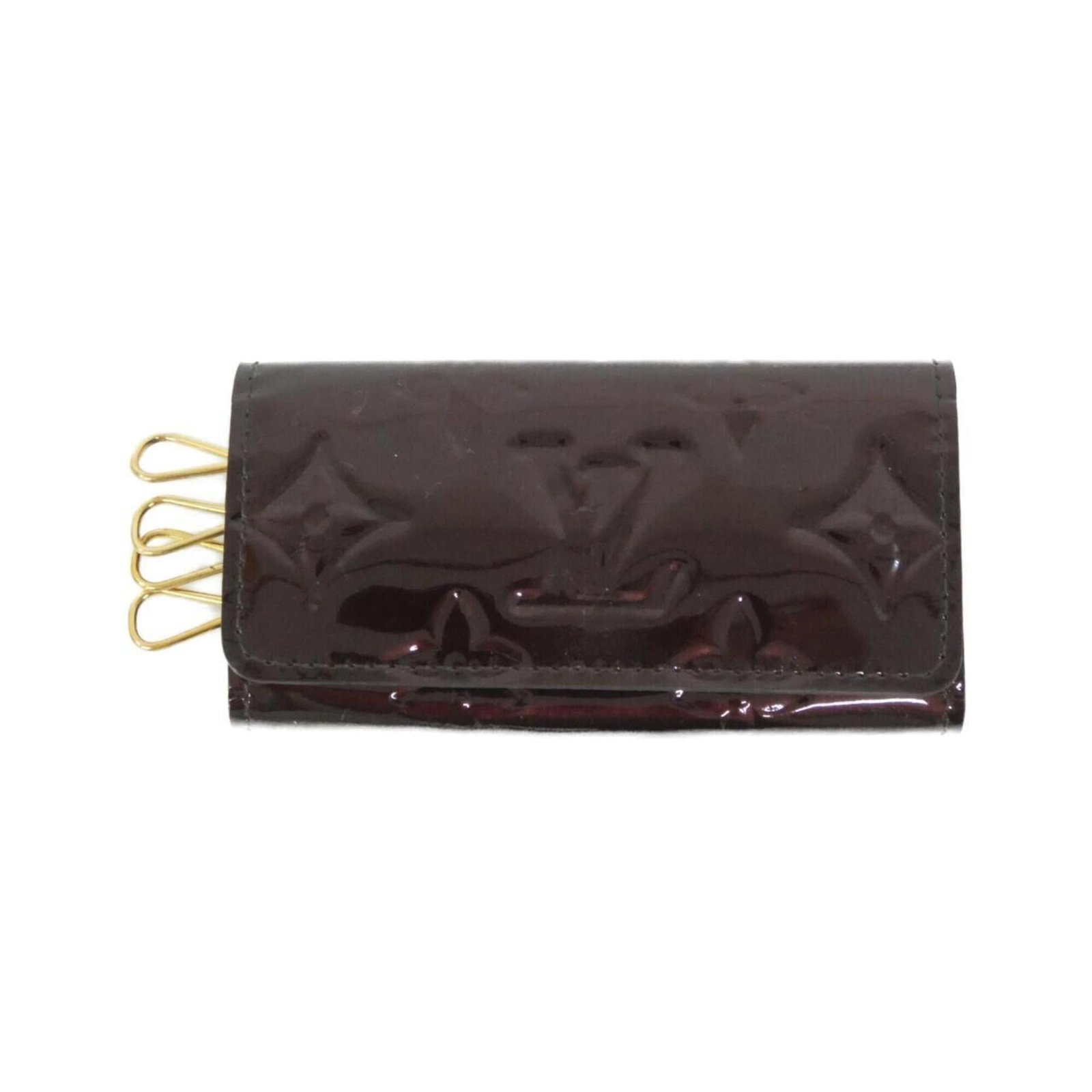 Vernis Multicles M91542 Louis Vuitton Key Case: Vernis Multicles M91542 Louis Vuitton Key Case Red Vernis Multicles Louis Vuitton Key Case, measuring 6cm x 11cm x 1cm, features a distinctive red color and Vernis material. The case has some scratche