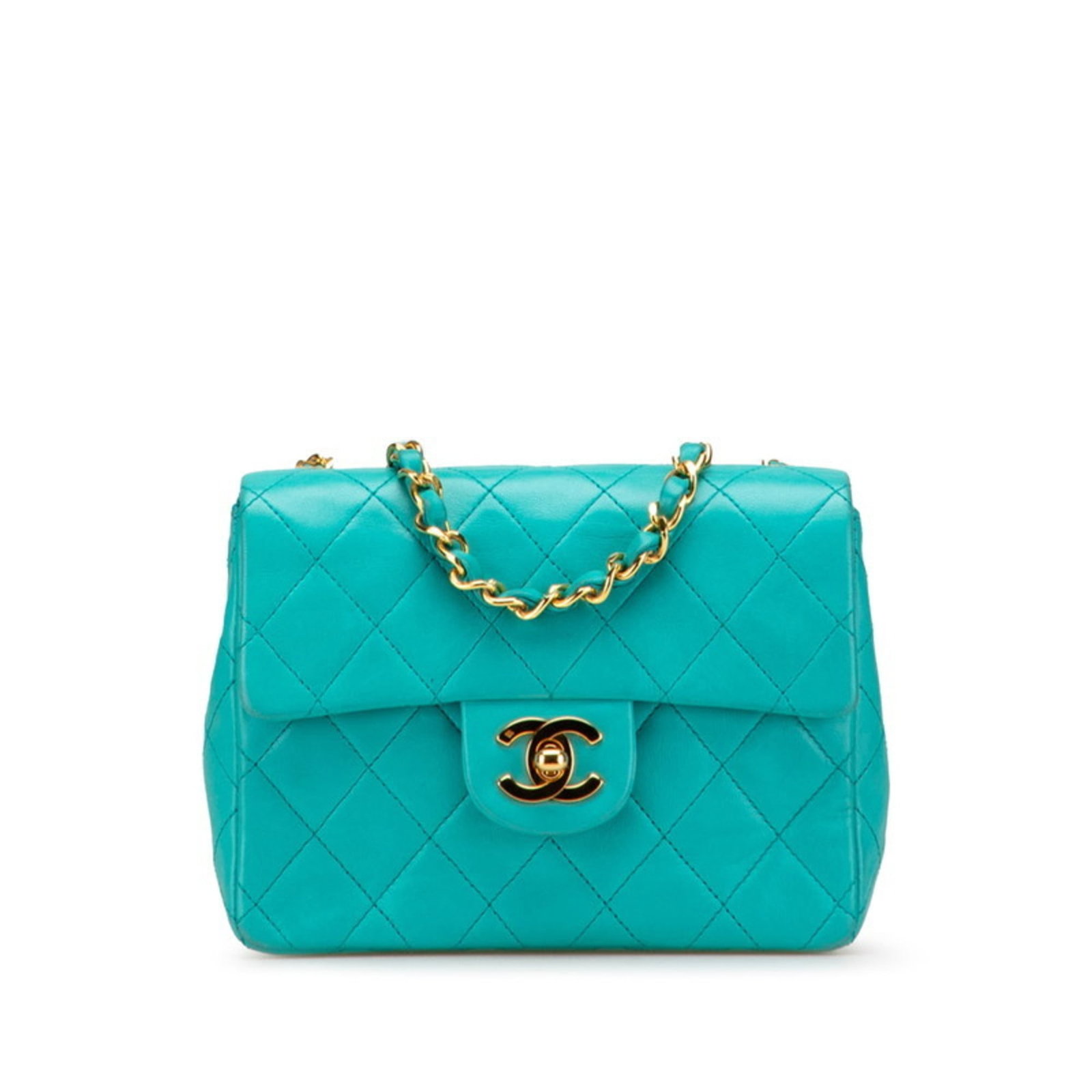 Shoulder bag leather Chanel: Shoulder bag leather Chanel This turquoise lambskin shoulder bag from Chanel features a classic design with a timeless elegance. With its worn-in look and minor scratches, it showcases the subtle sign