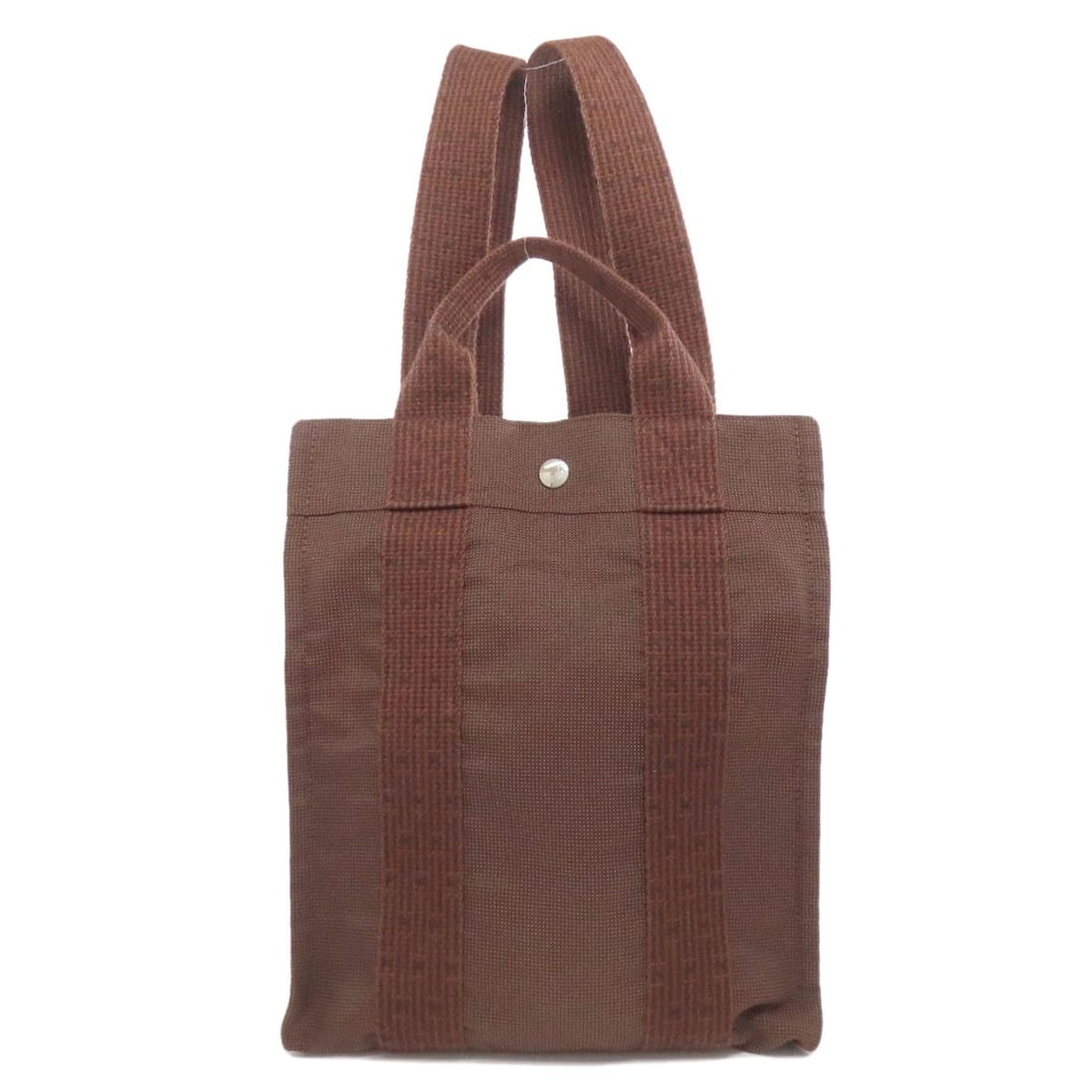 Hermes Her Line Add Canvas Backpack Daypack Pm: Hermes Her Line Add Canvas Backpack Daypack Pm Brown canvas backpack with signature from the artist, featuring the iconic Herm?s Her Line design. This stylish daypack boasts a classic, timeless look t